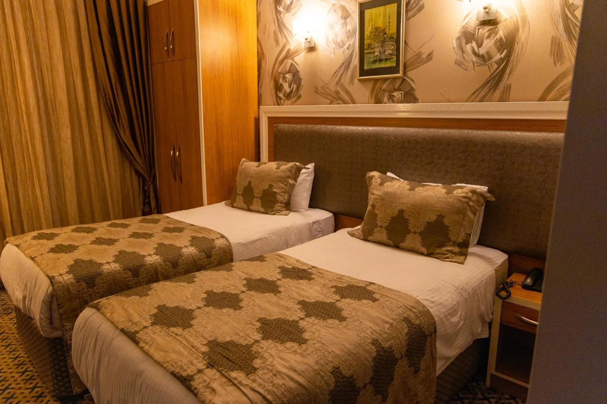 Bed in Grand Rosa Hotel