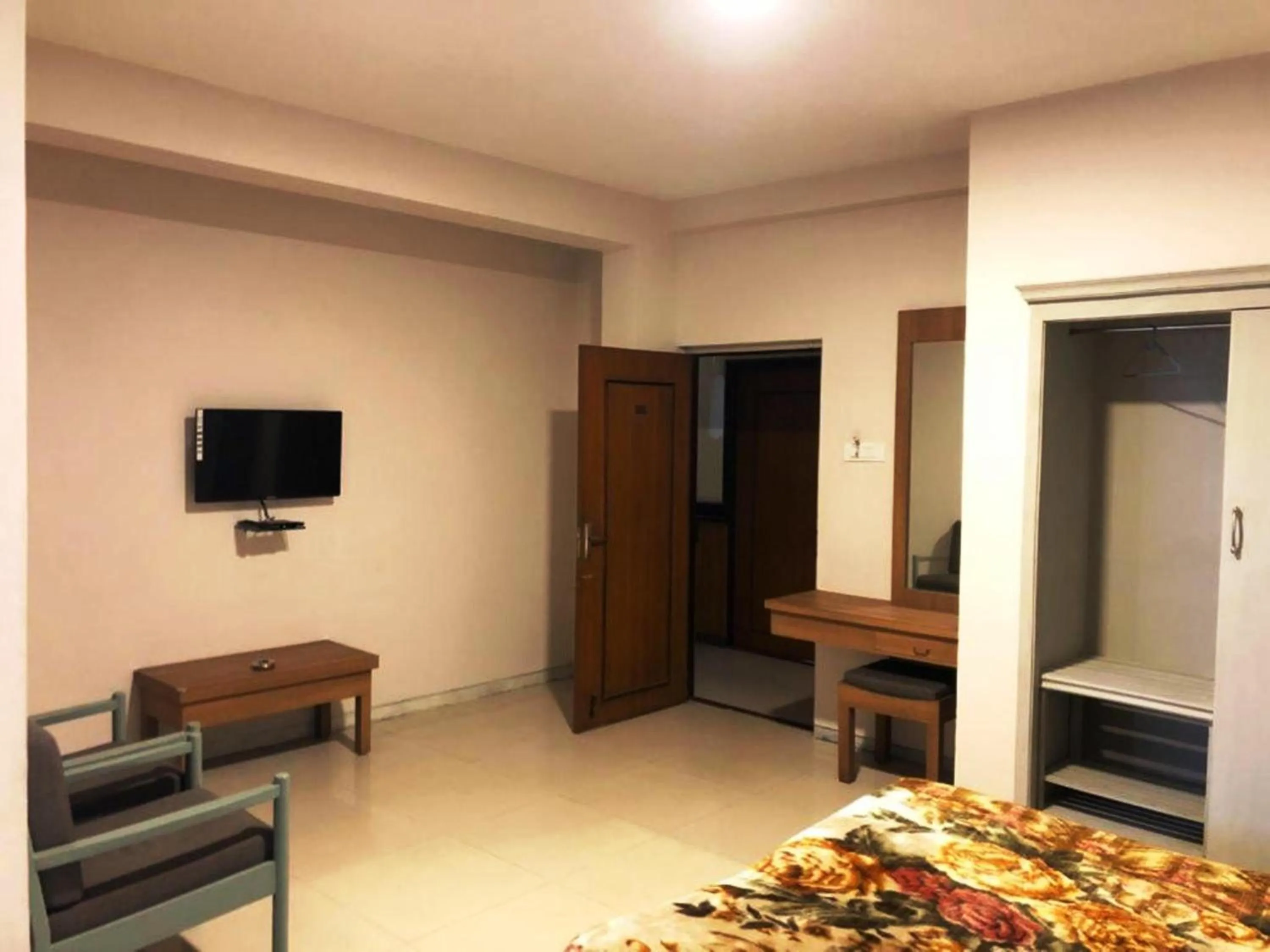 Bed in Hotel Preethi Palace