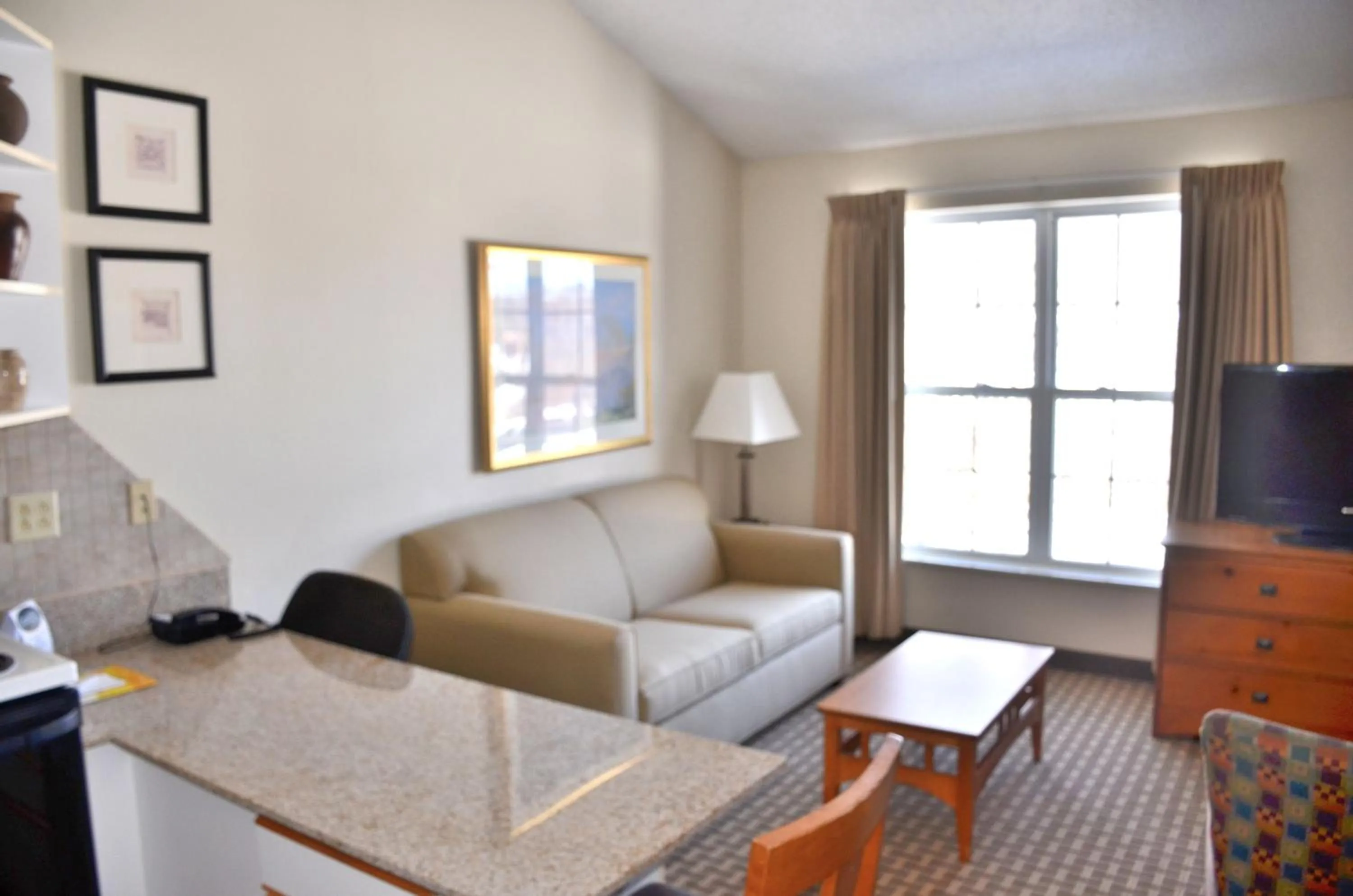 Living room in Cresthill Suites Syracuse