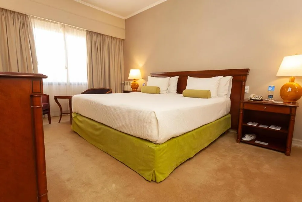 Bed in Austral Plaza Hotel