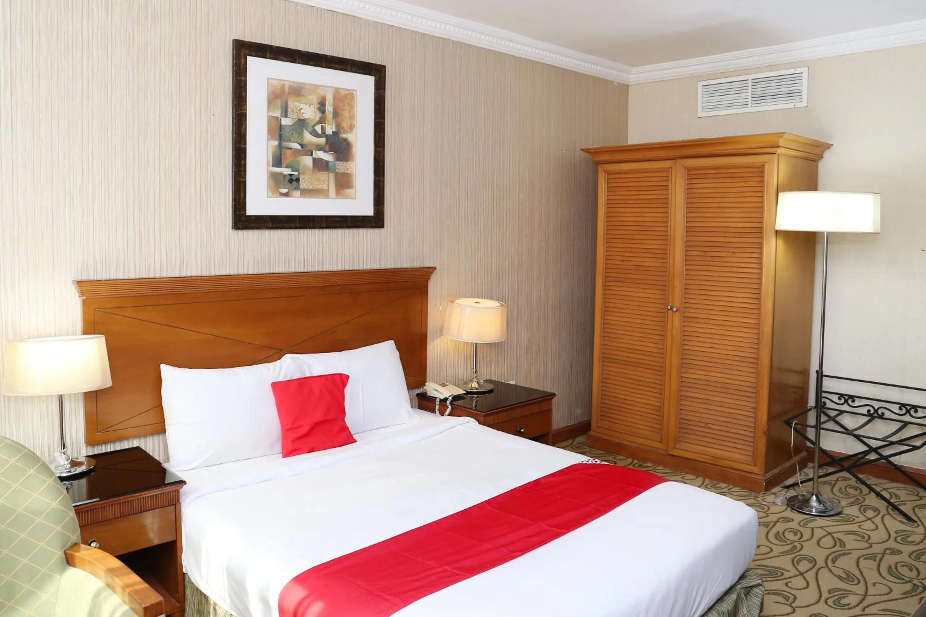 Bed in City Plaza Hotel