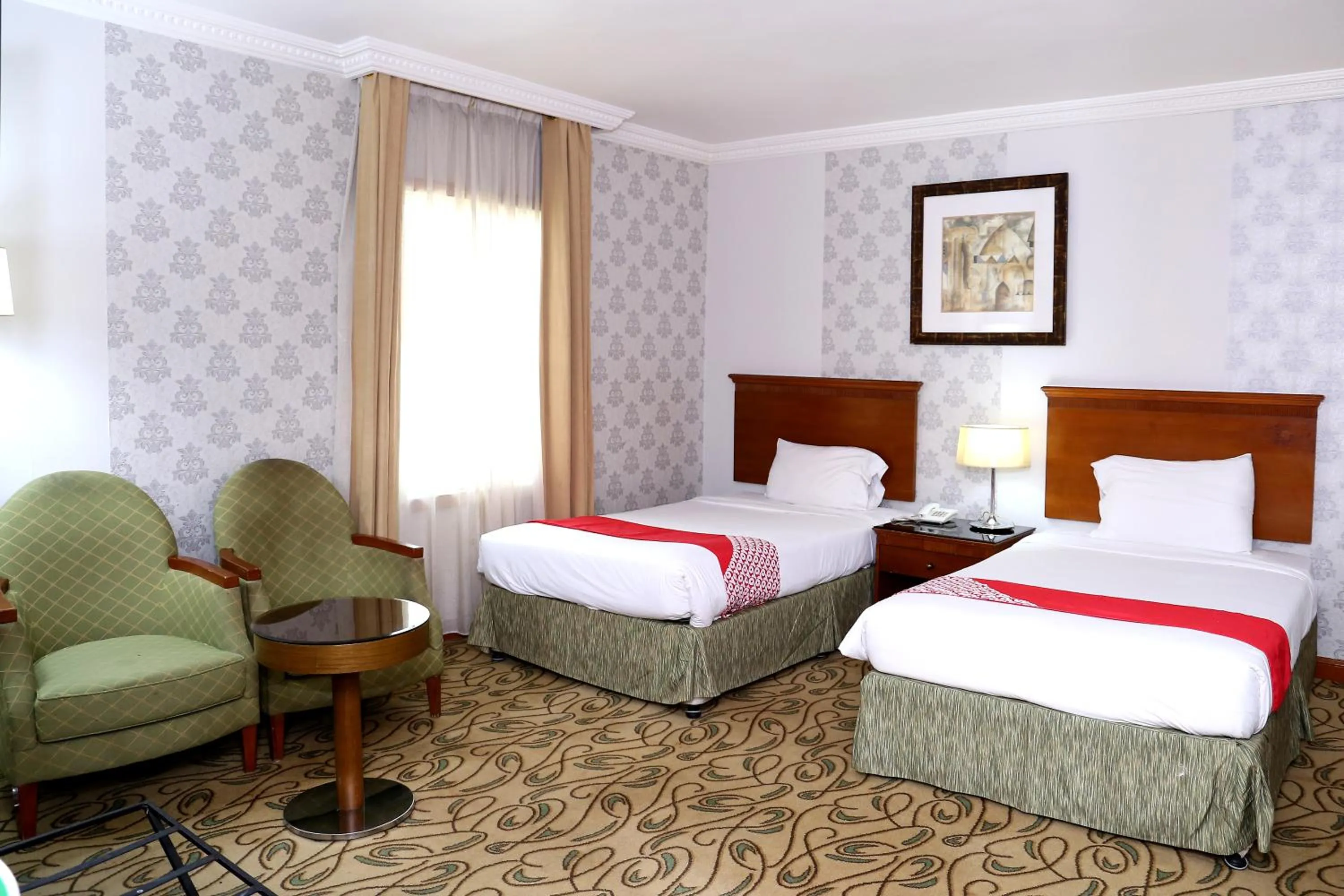 Bed in City Plaza Hotel