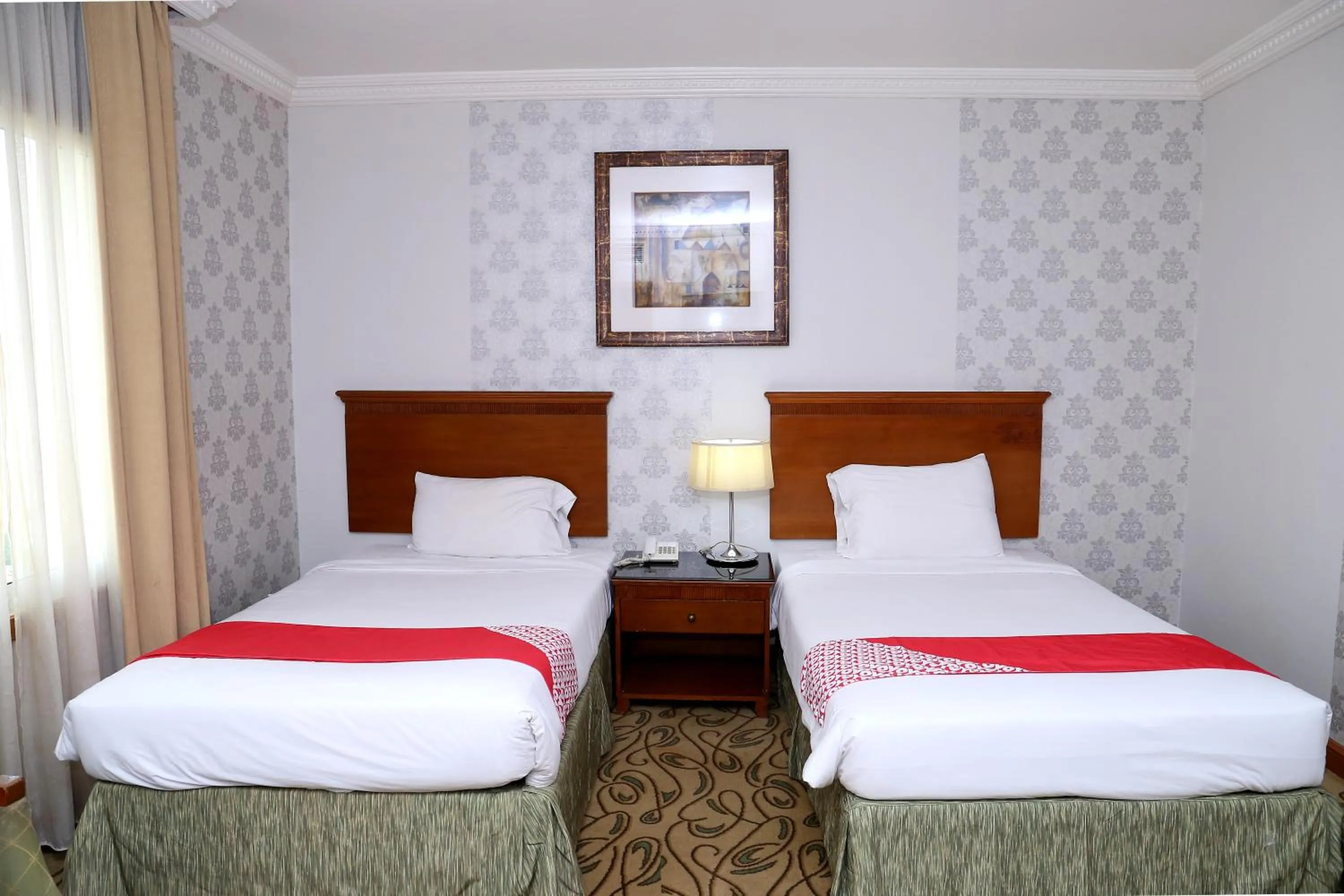 Bed in City Plaza Hotel