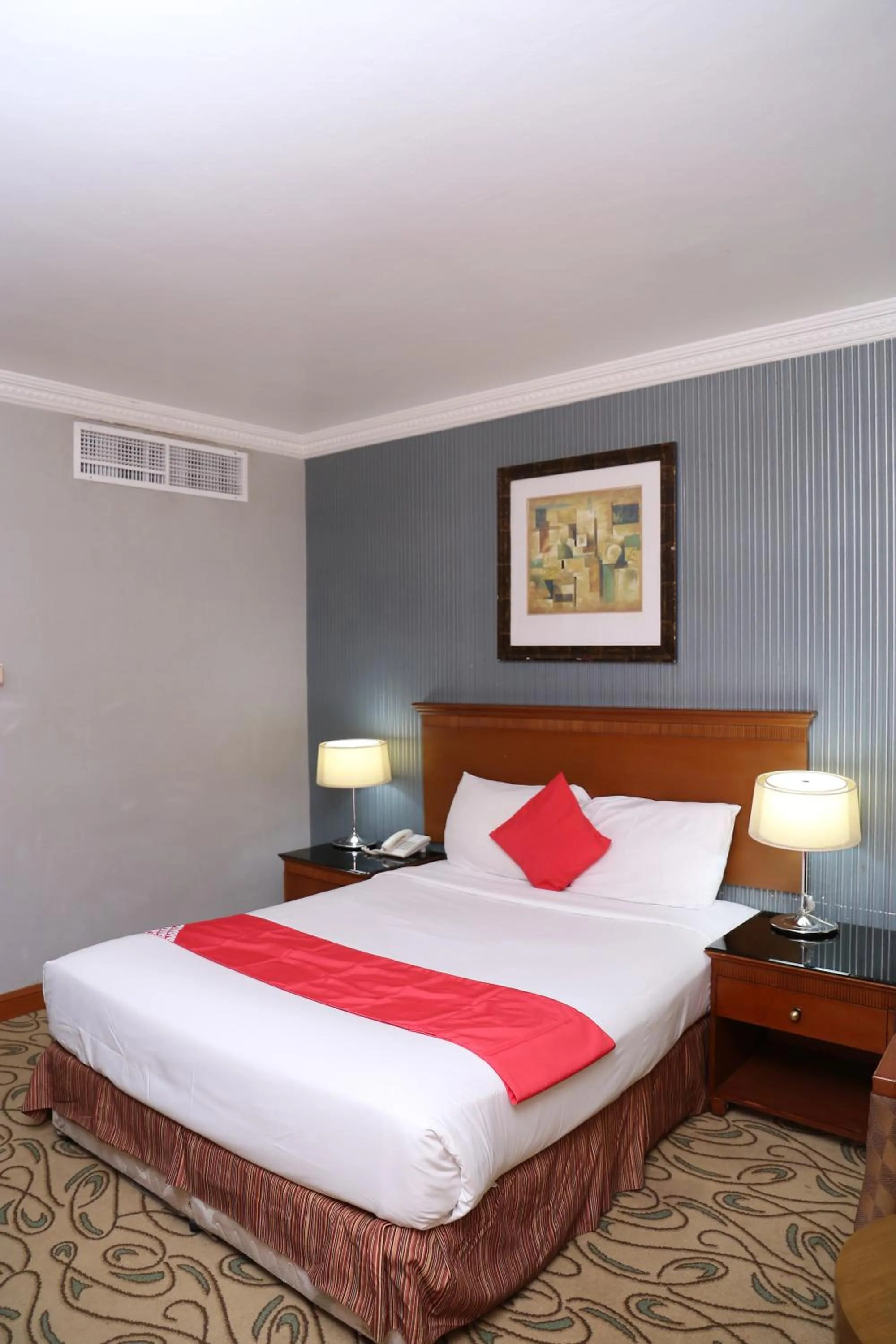 Bed in City Plaza Hotel