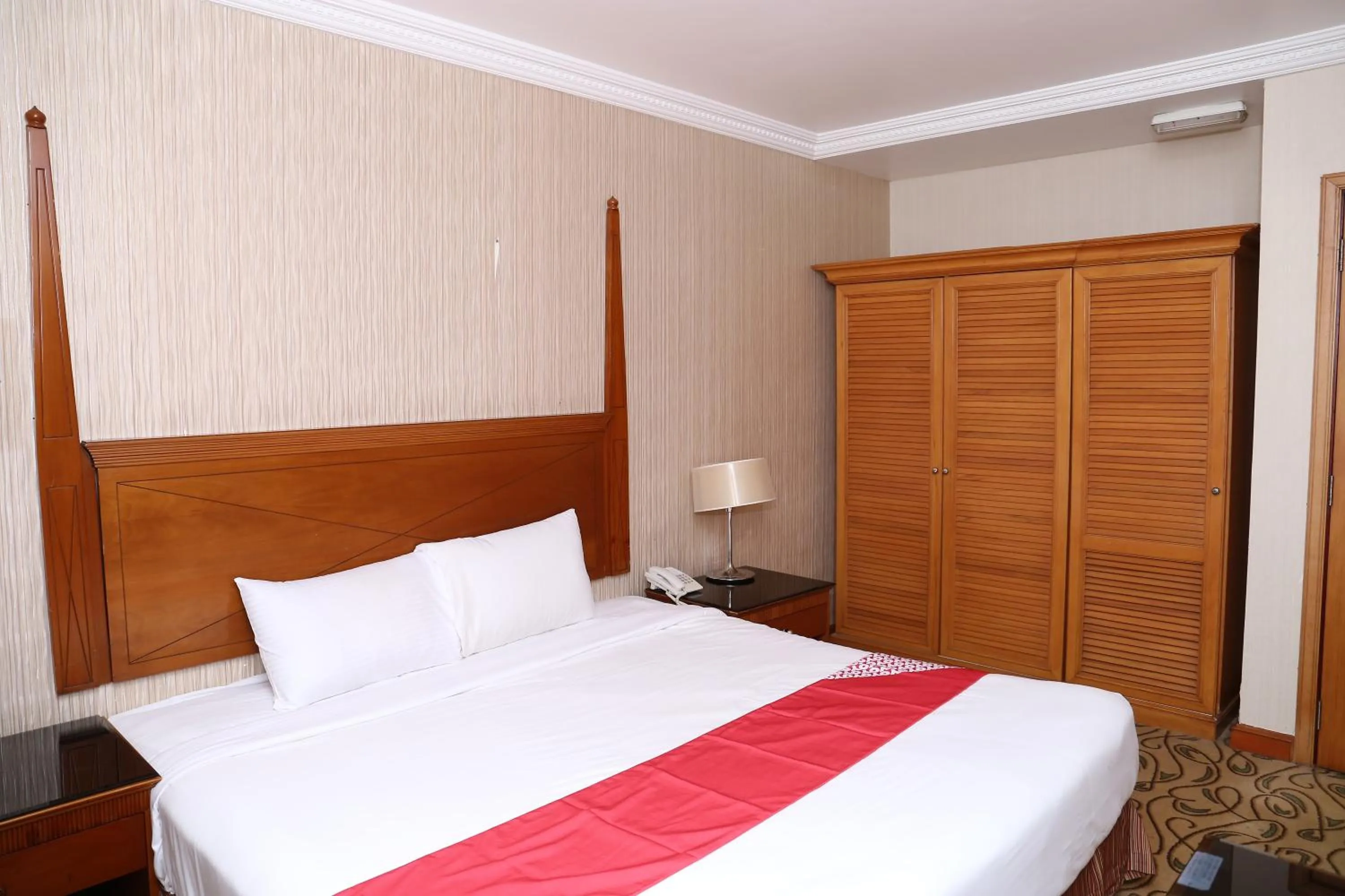 Bed in City Plaza Hotel