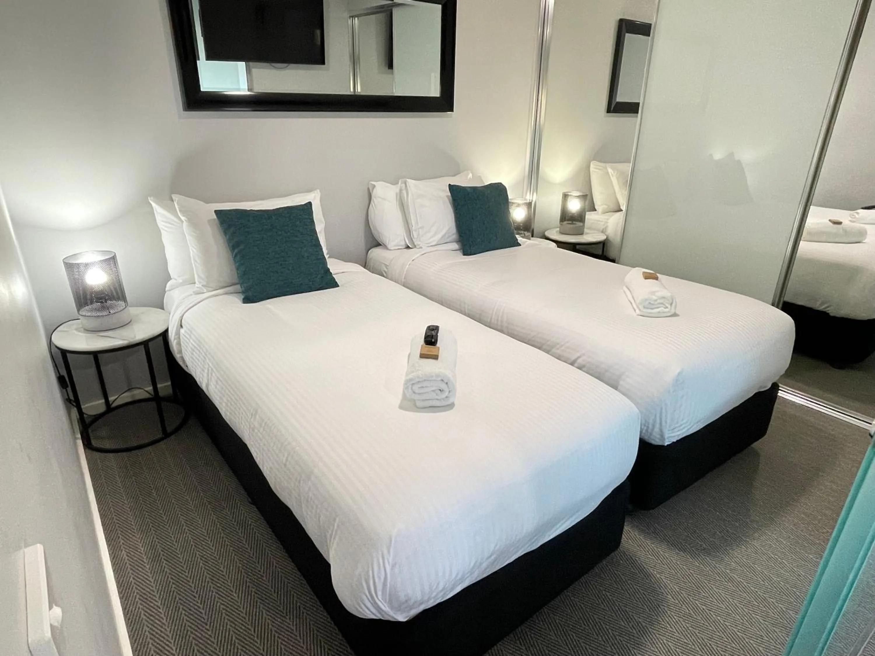 Bed in Honeysuckle Executive Apartments