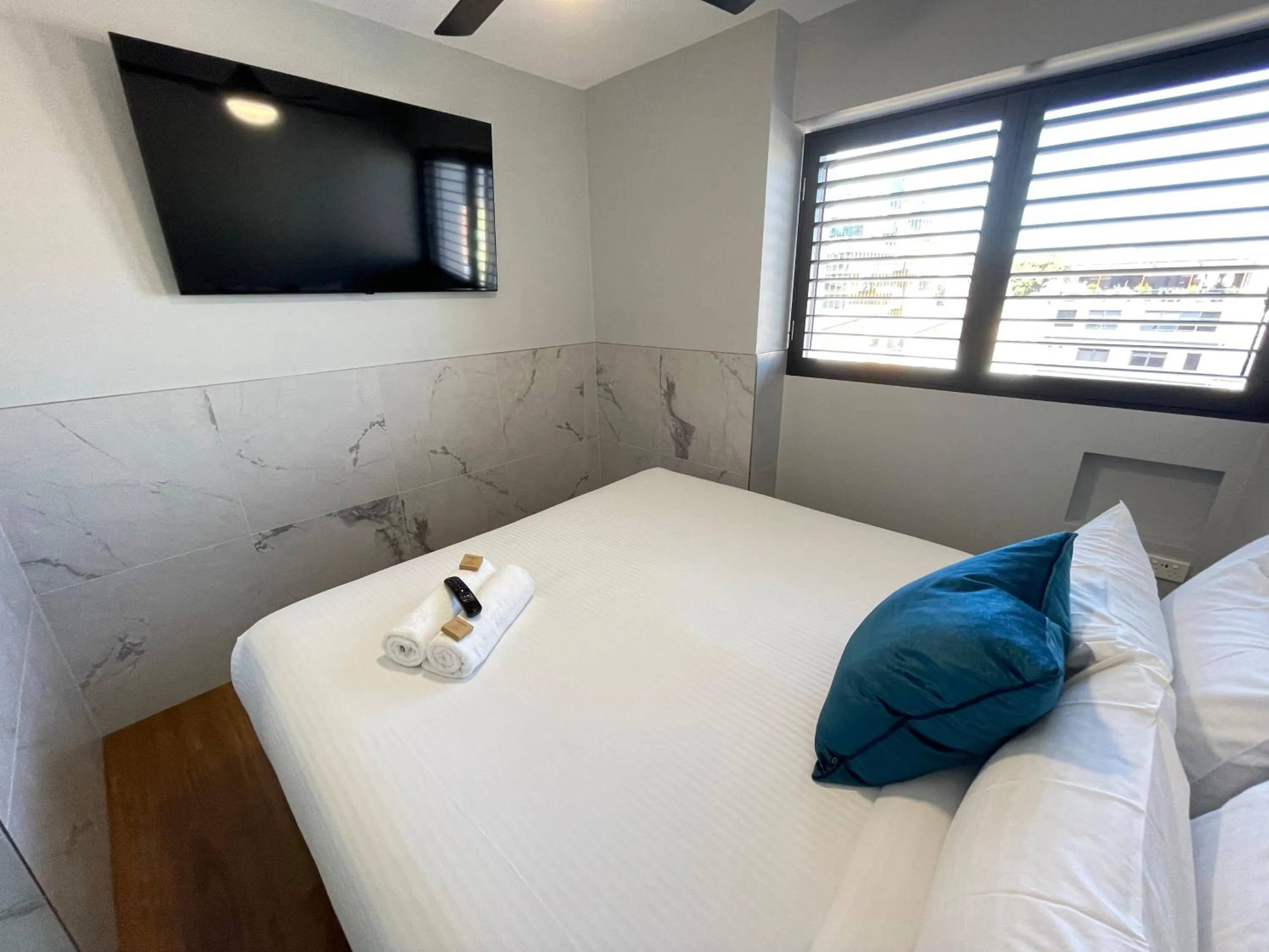 Bed in Honeysuckle Executive Apartments