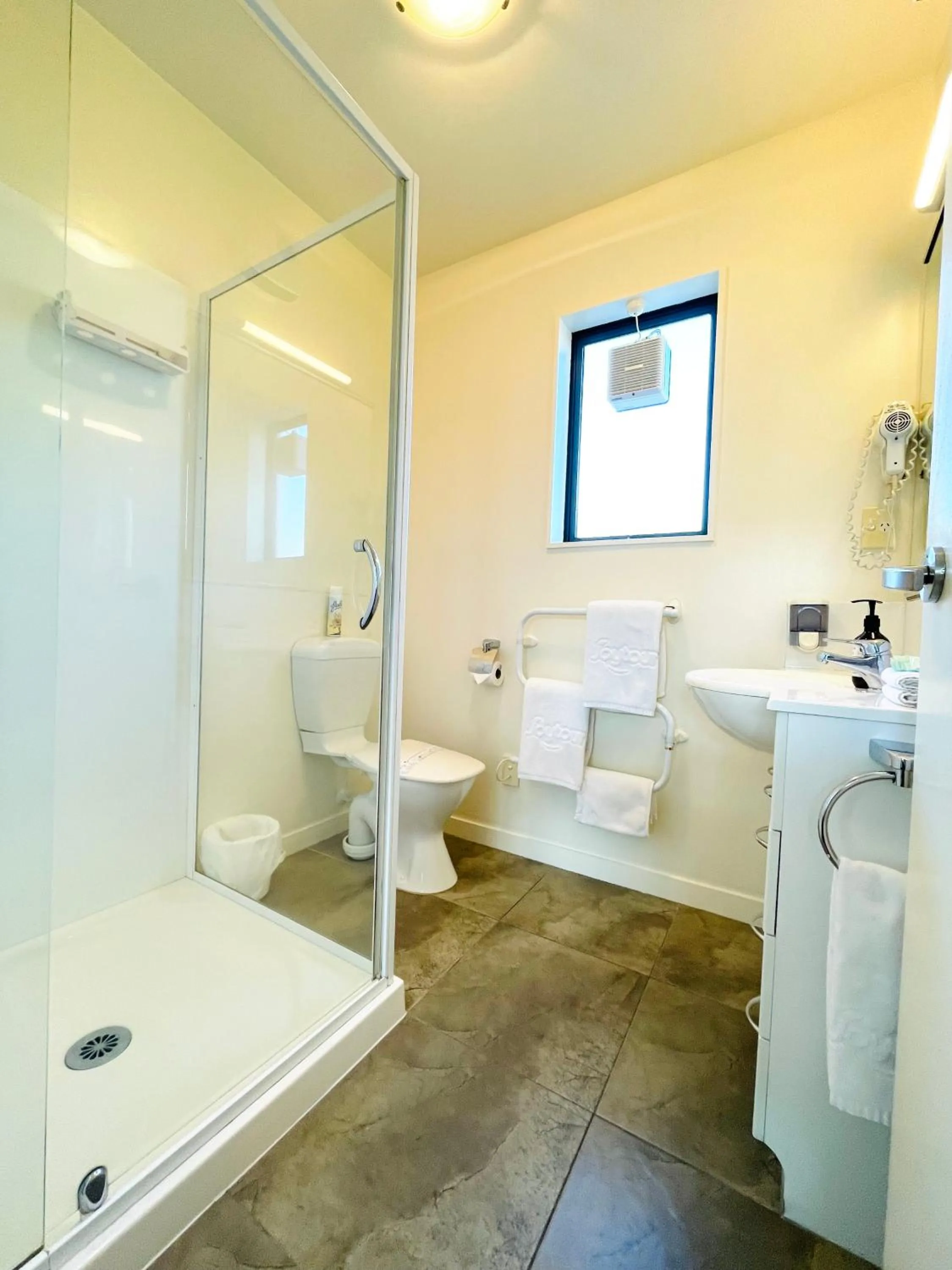 Shower in 298 Westside Motor Lodge