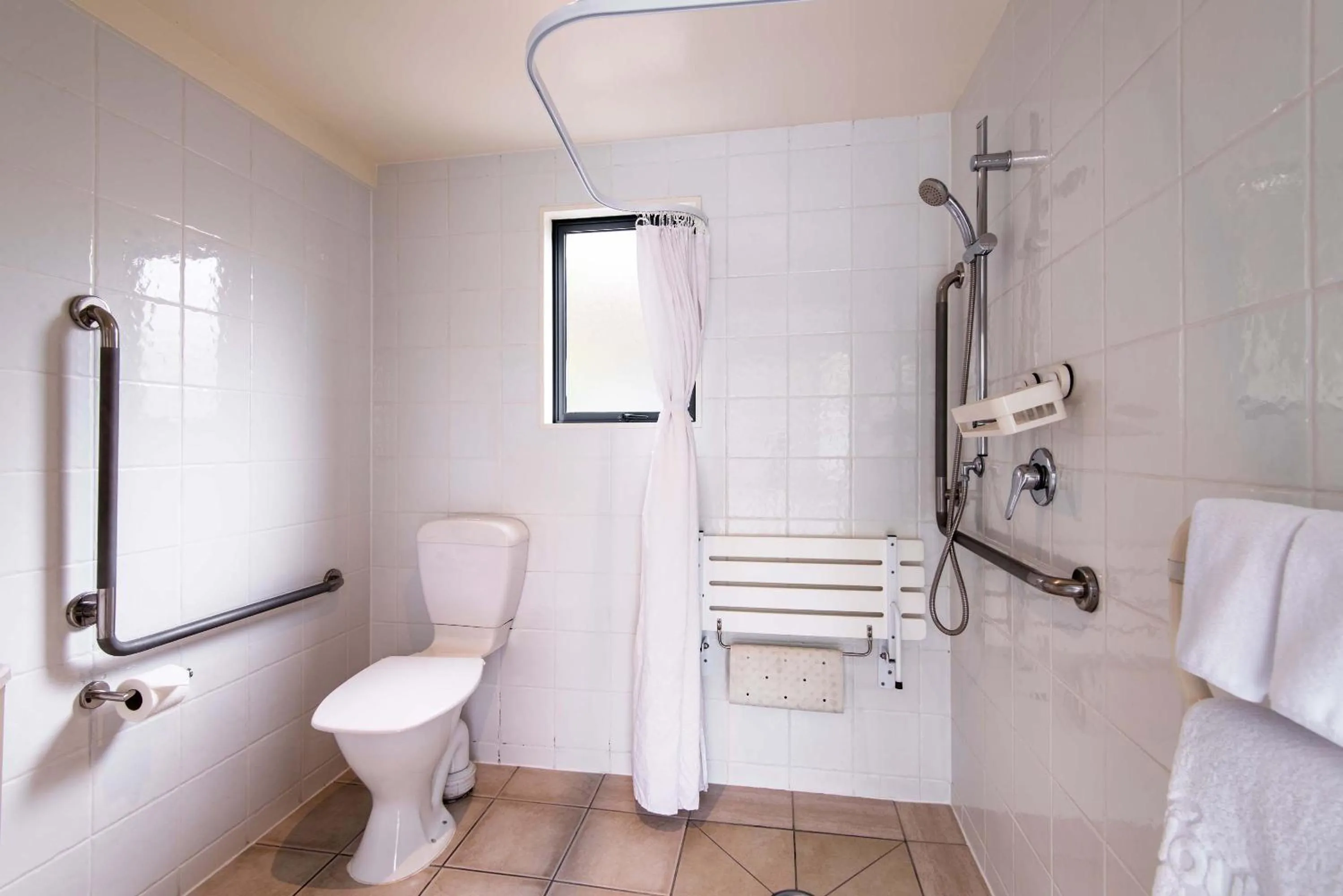 Shower in 298 Westside Motor Lodge