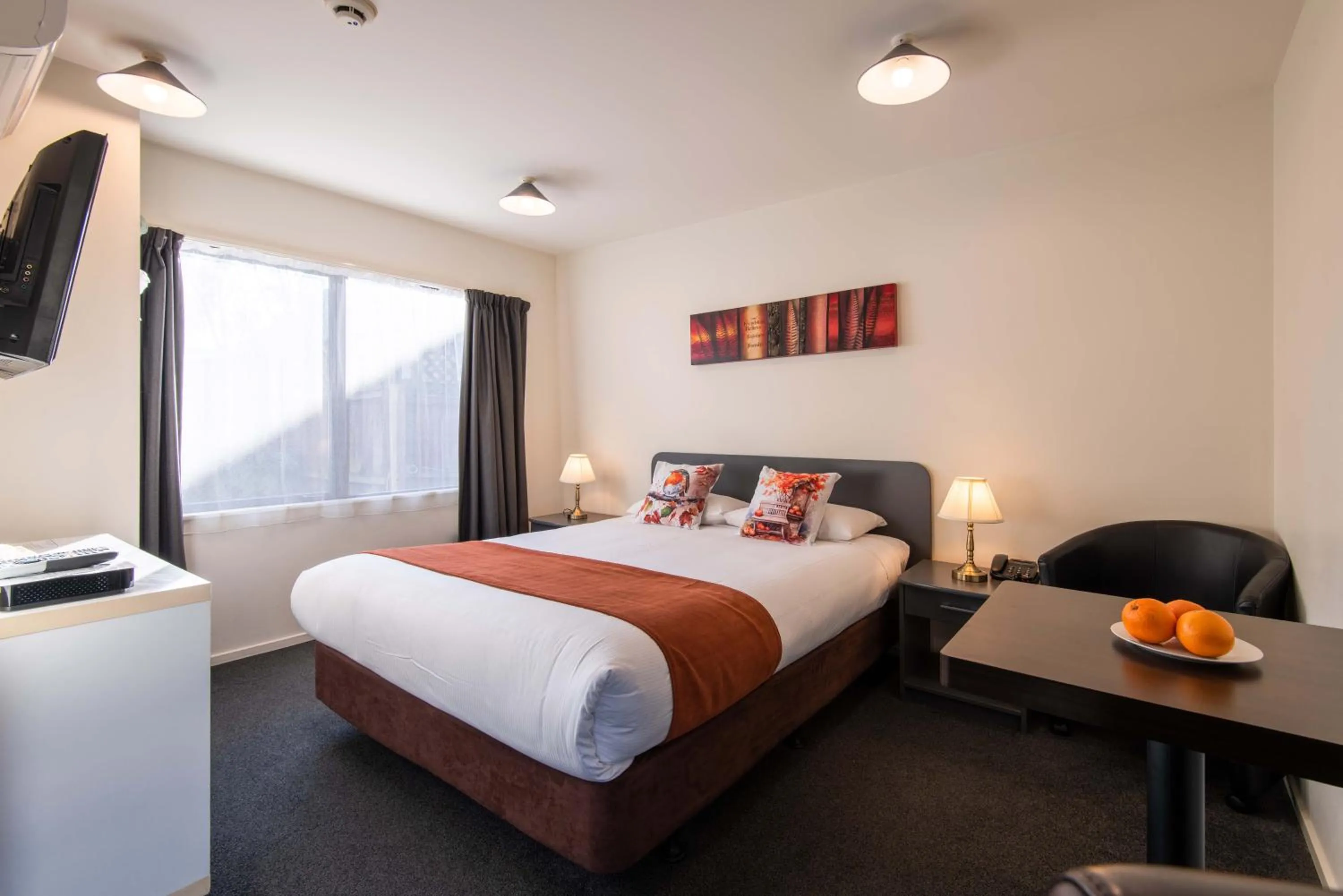 Bed in 298 Westside Motor Lodge