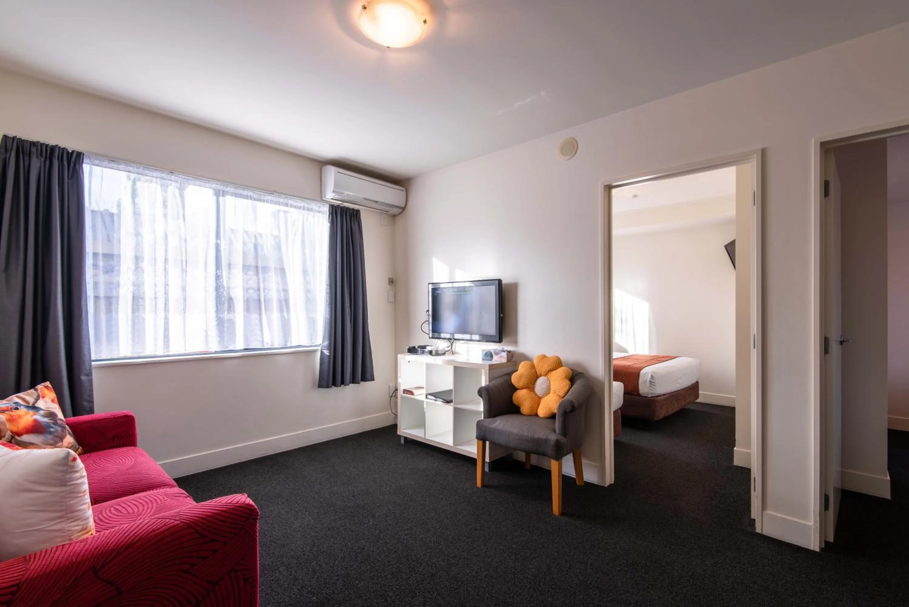 Bed in 298 Westside Motor Lodge