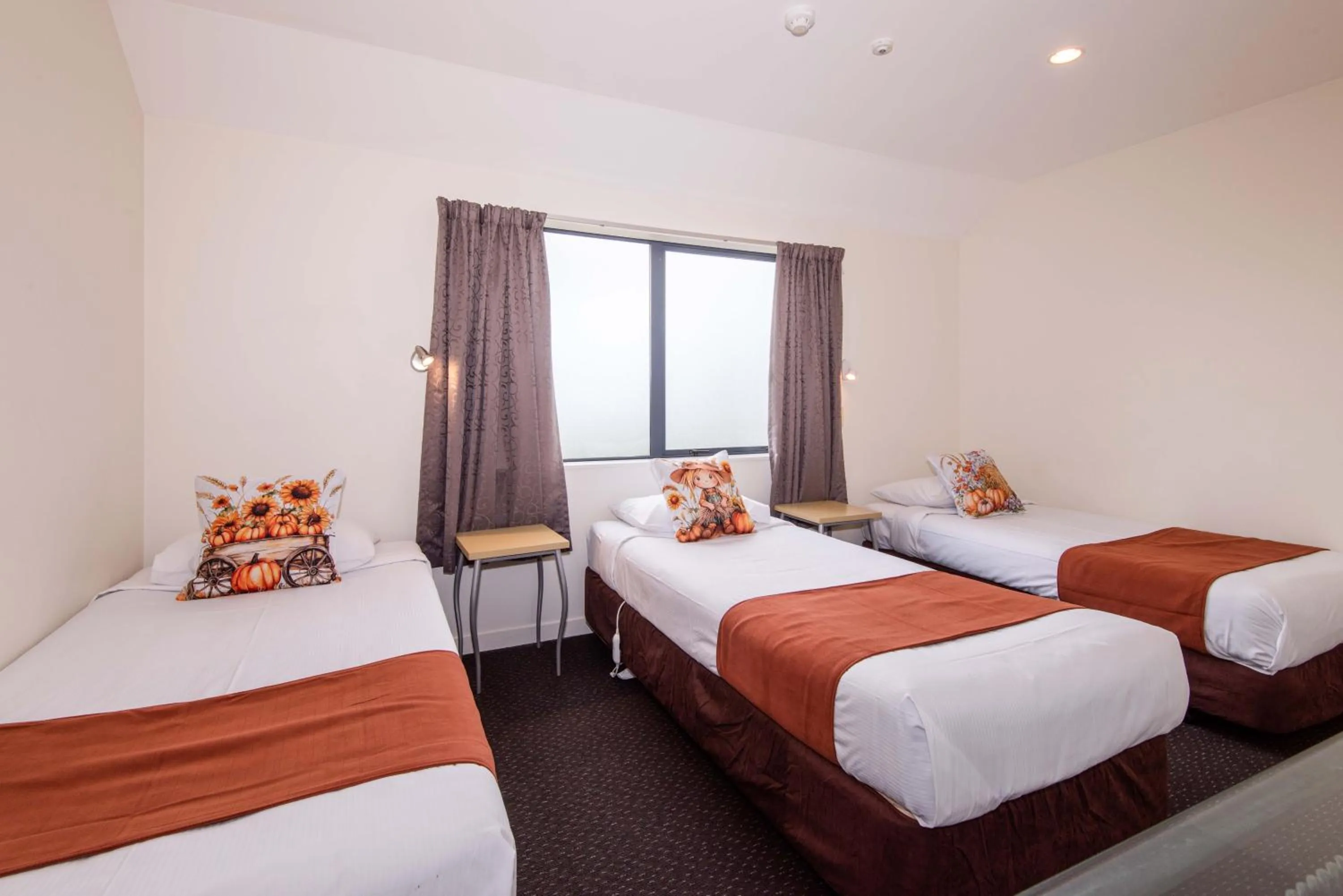 Bed in 298 Westside Motor Lodge