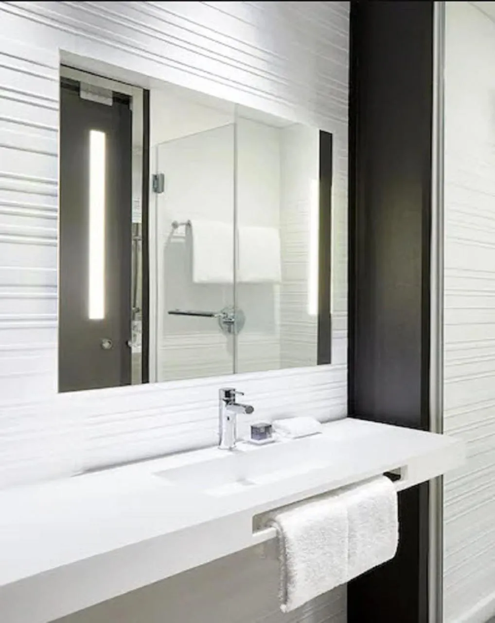 Bathroom in AC Hotel by Marriott Oklahoma City Bricktown