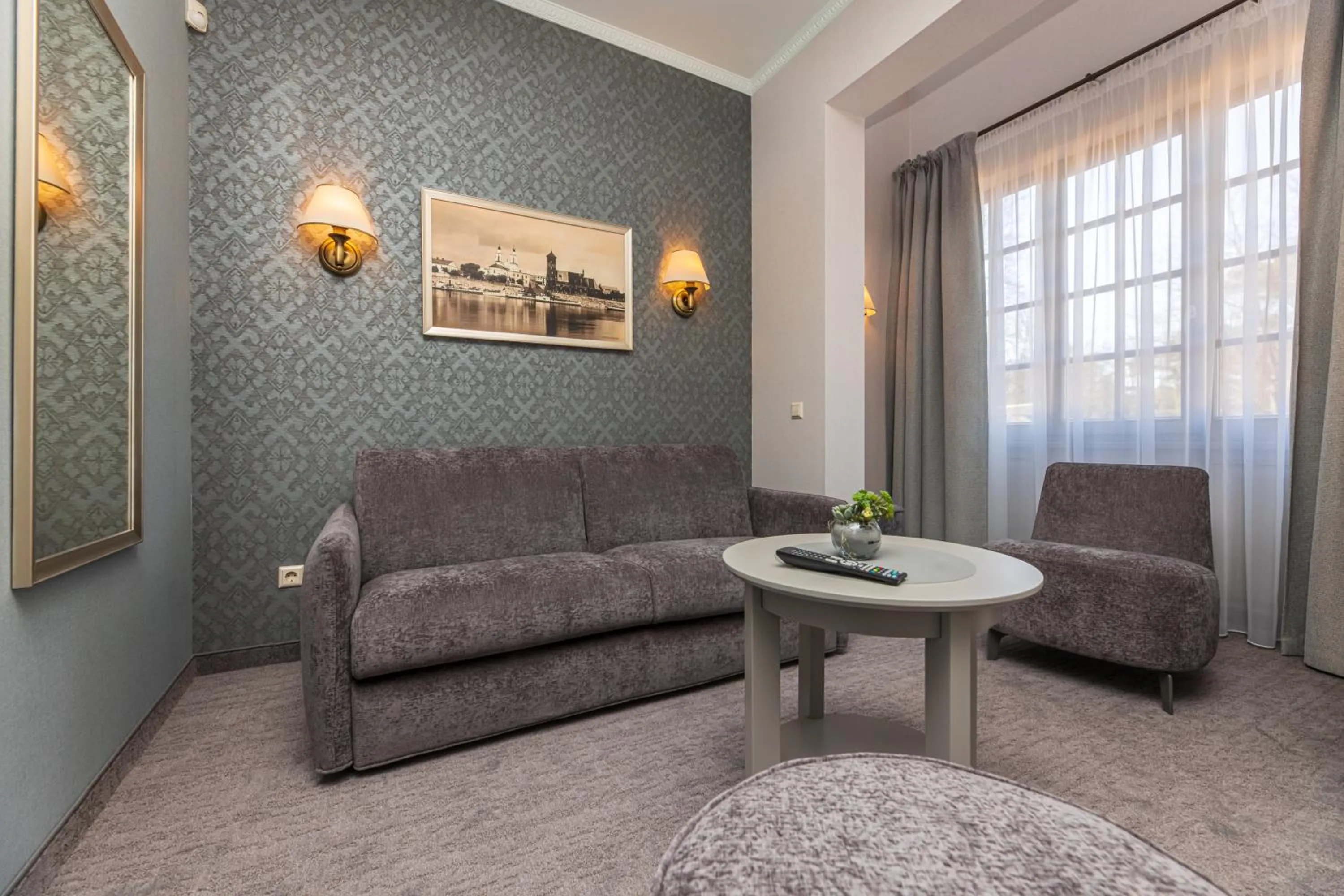 Seating area in Senoji Hansa Hotel