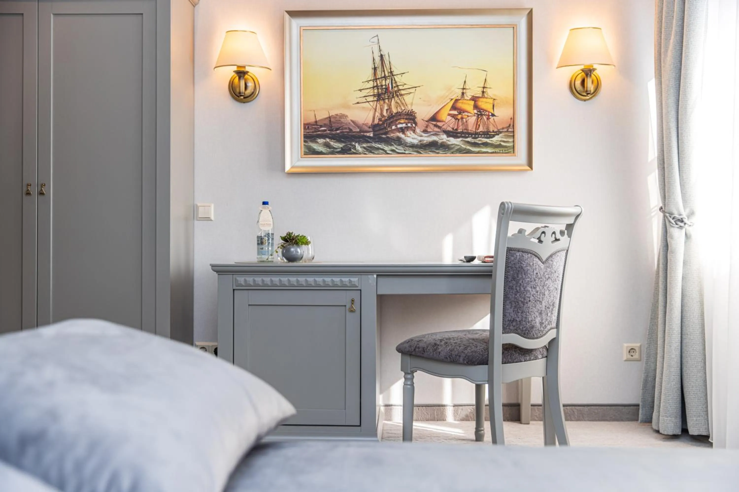 Seating area, Bed in Senoji Hansa Hotel