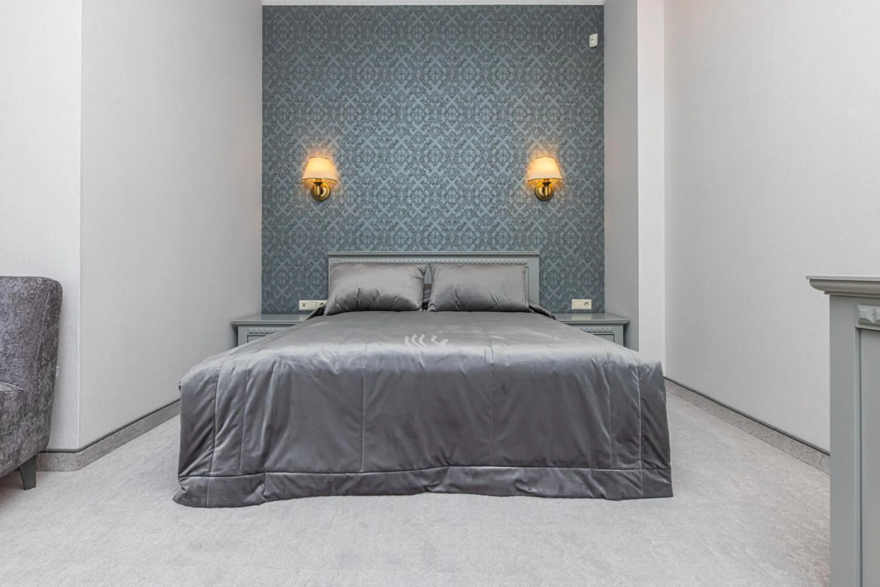 Bed in Senoji Hansa Hotel