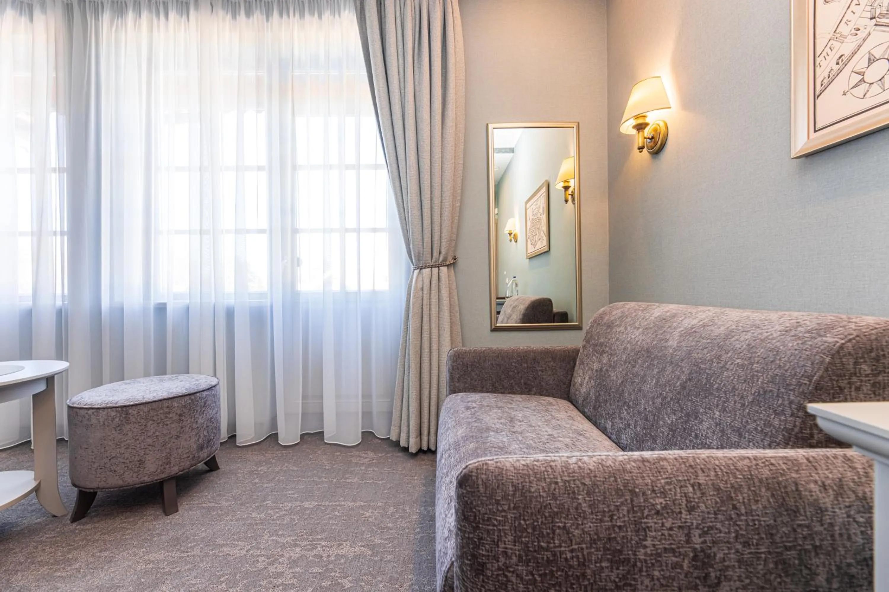 Seating area in Senoji Hansa Hotel