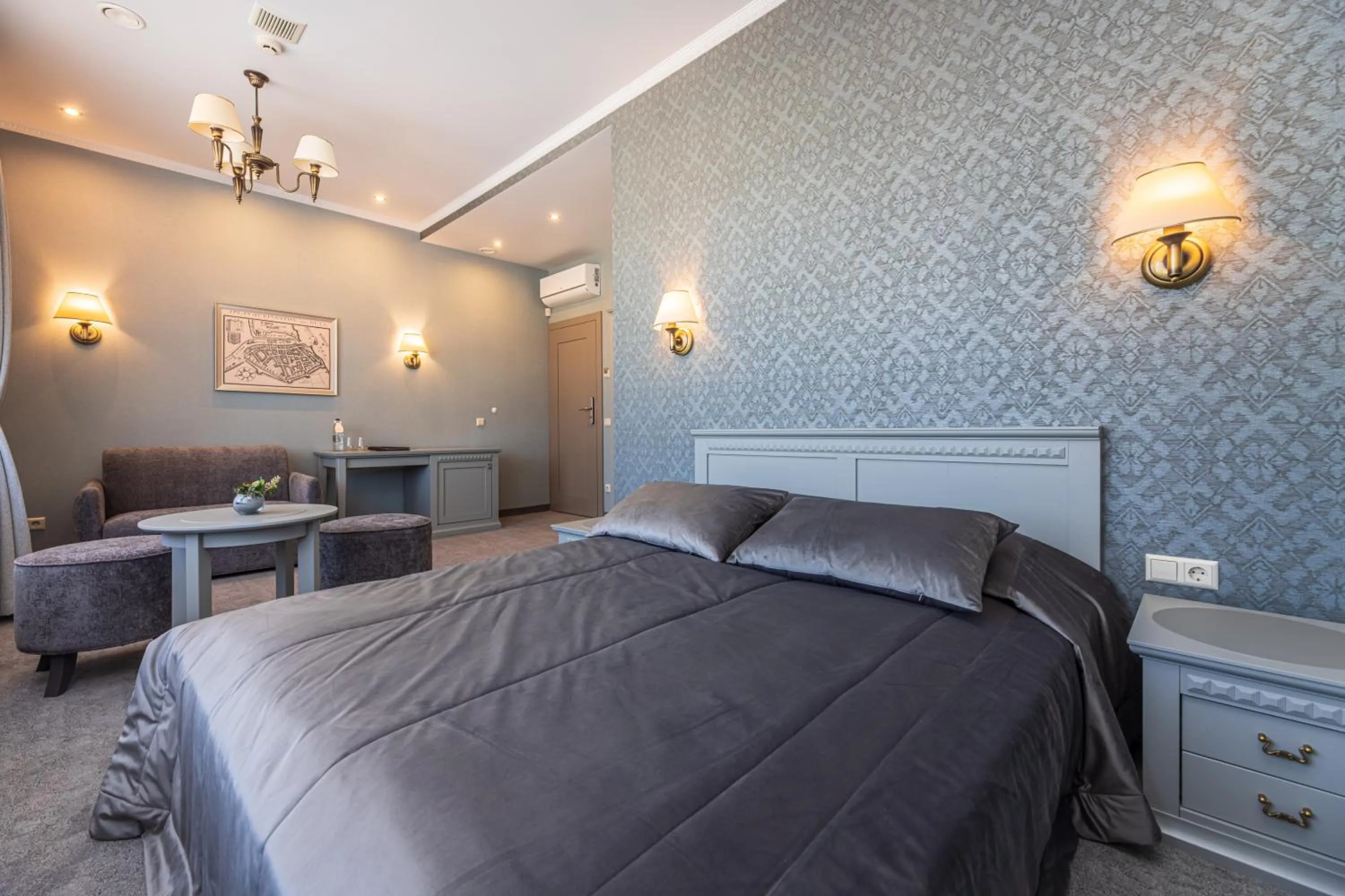 Bed in Senoji Hansa Hotel