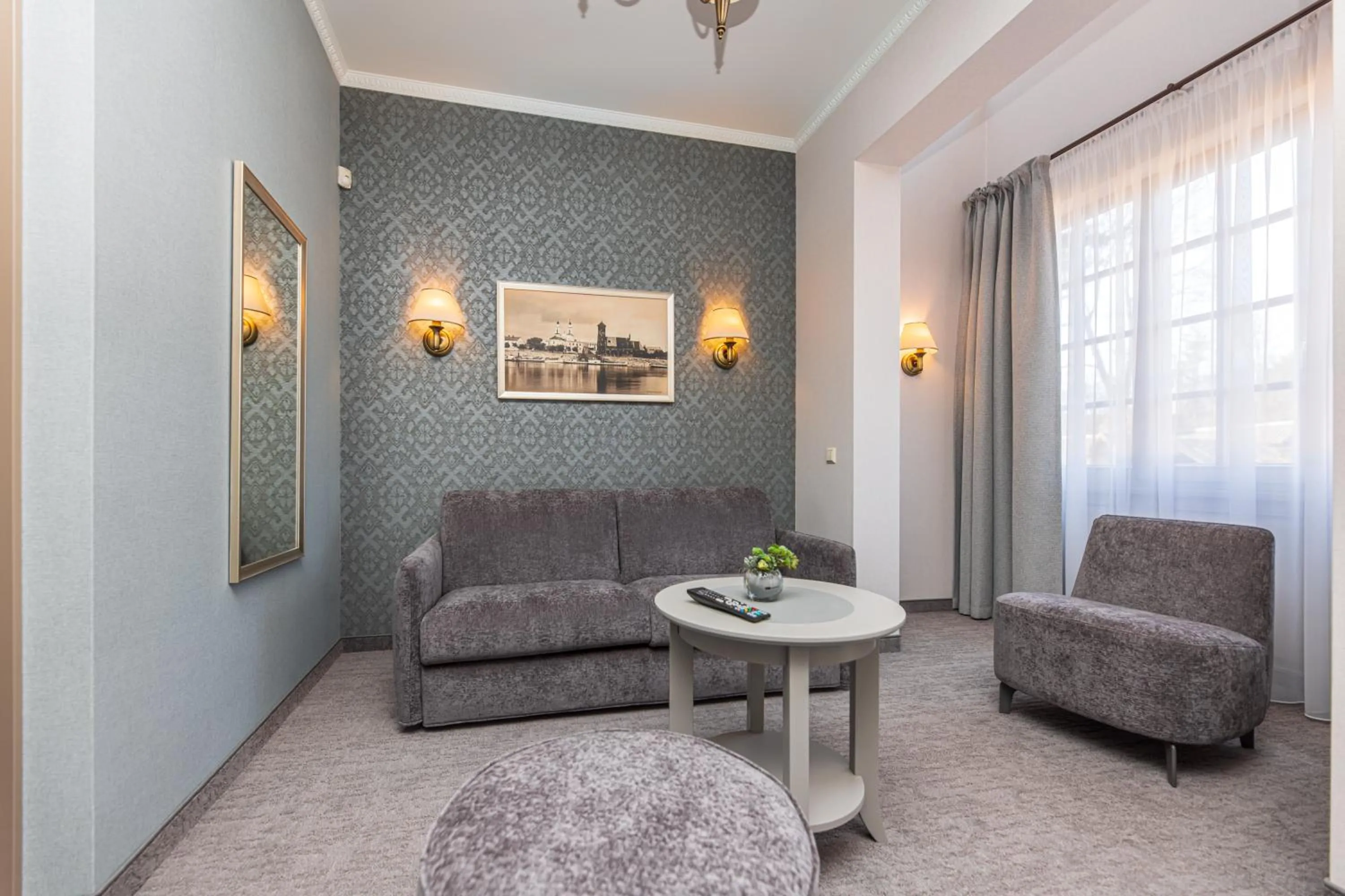 Seating area in Senoji Hansa Hotel