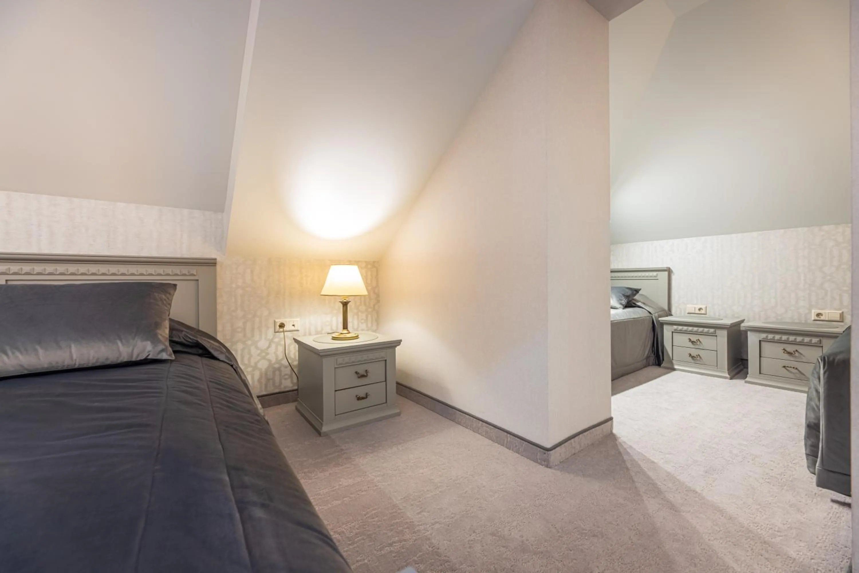 Bed in Senoji Hansa Hotel