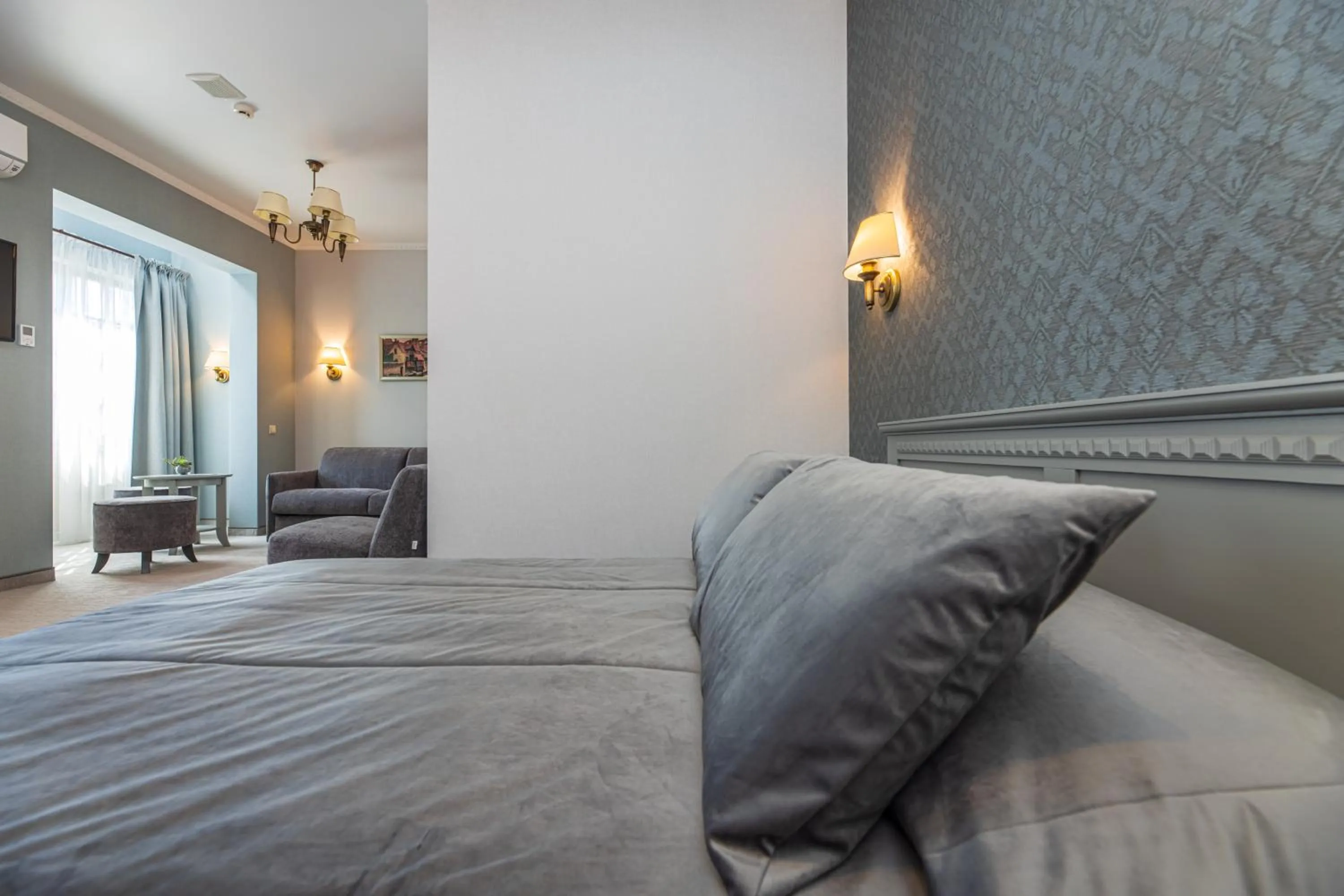 Bed in Senoji Hansa Hotel