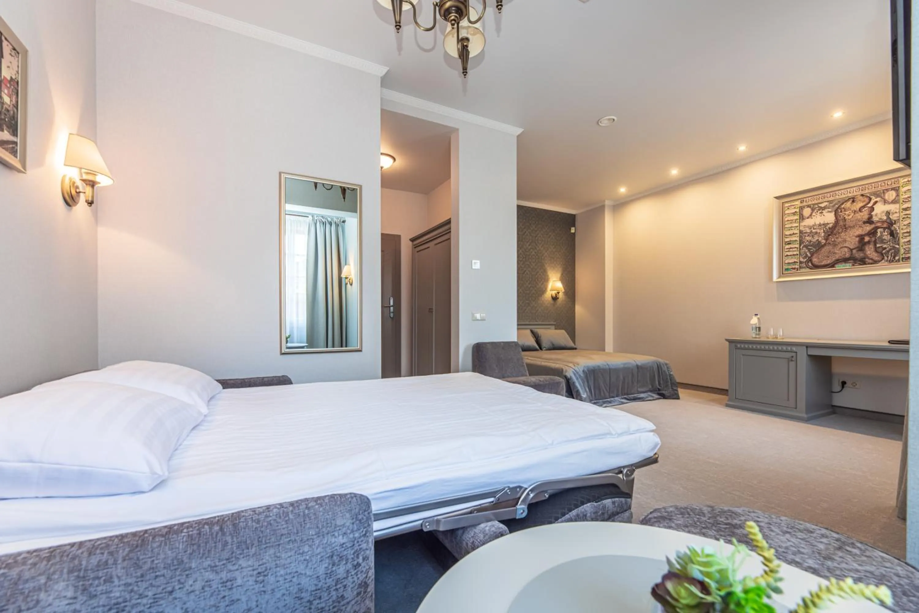 Bed in Senoji Hansa Hotel