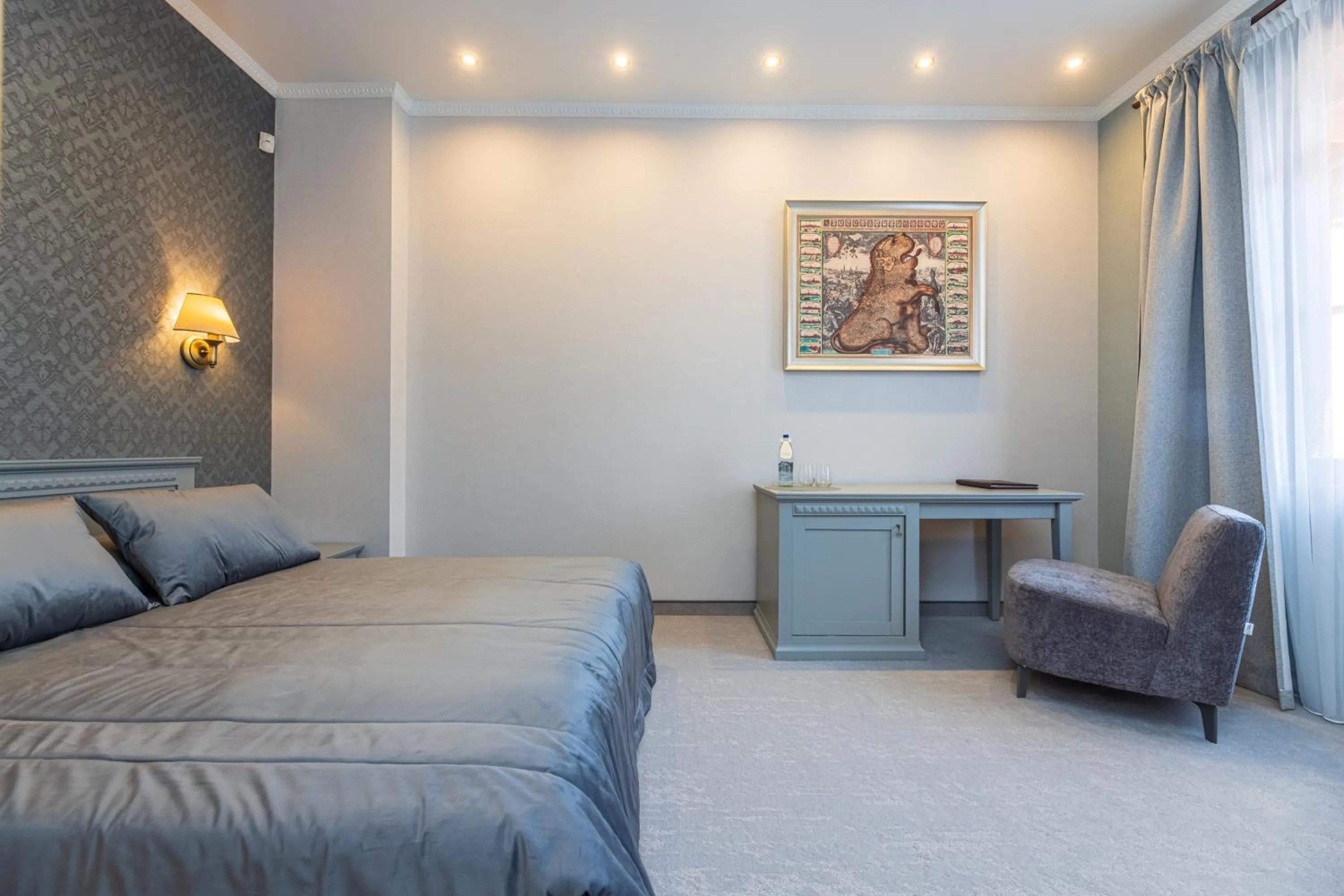 Bed in Senoji Hansa Hotel