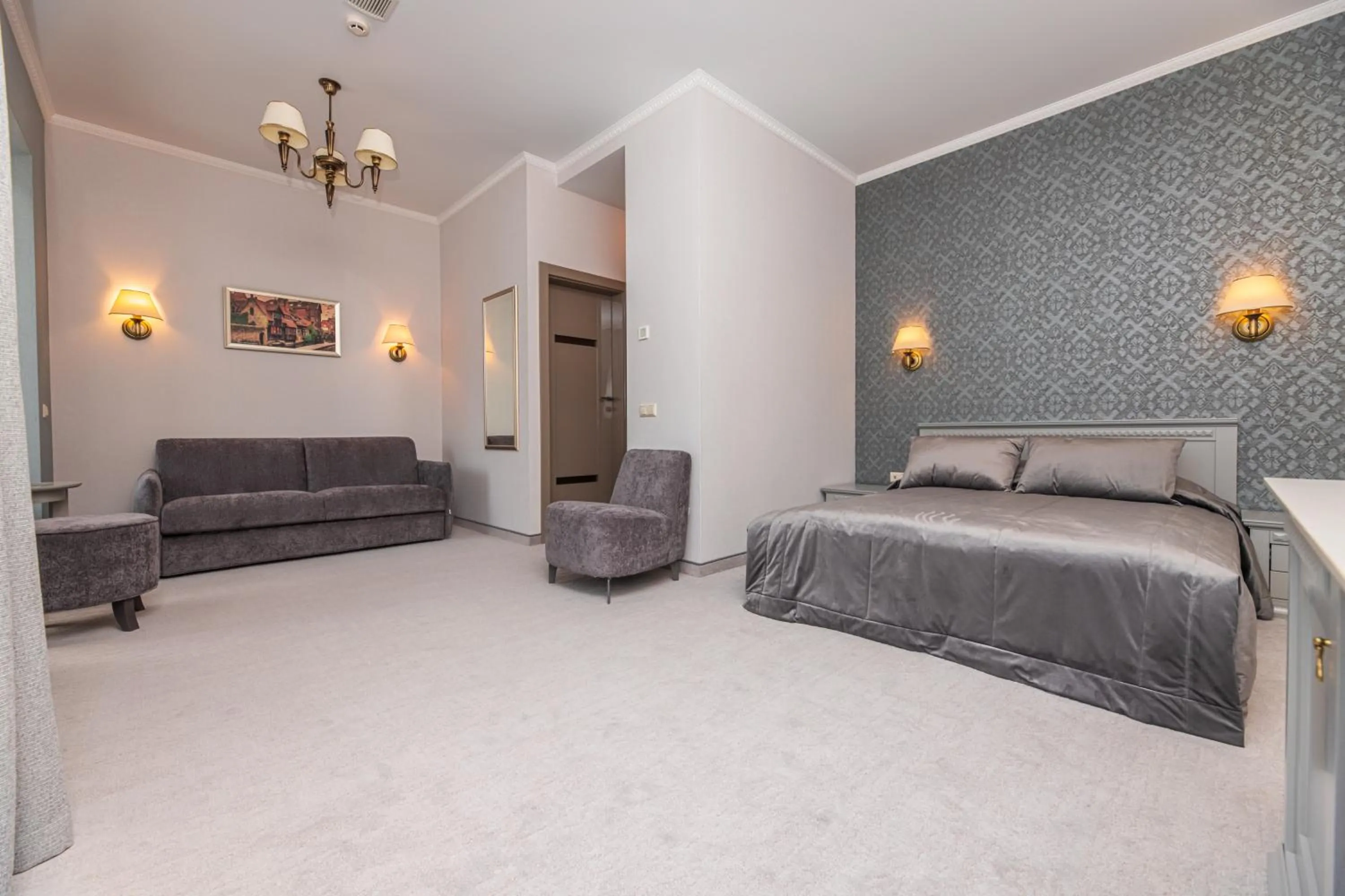 Photo of the whole room, Bed in Senoji Hansa Hotel