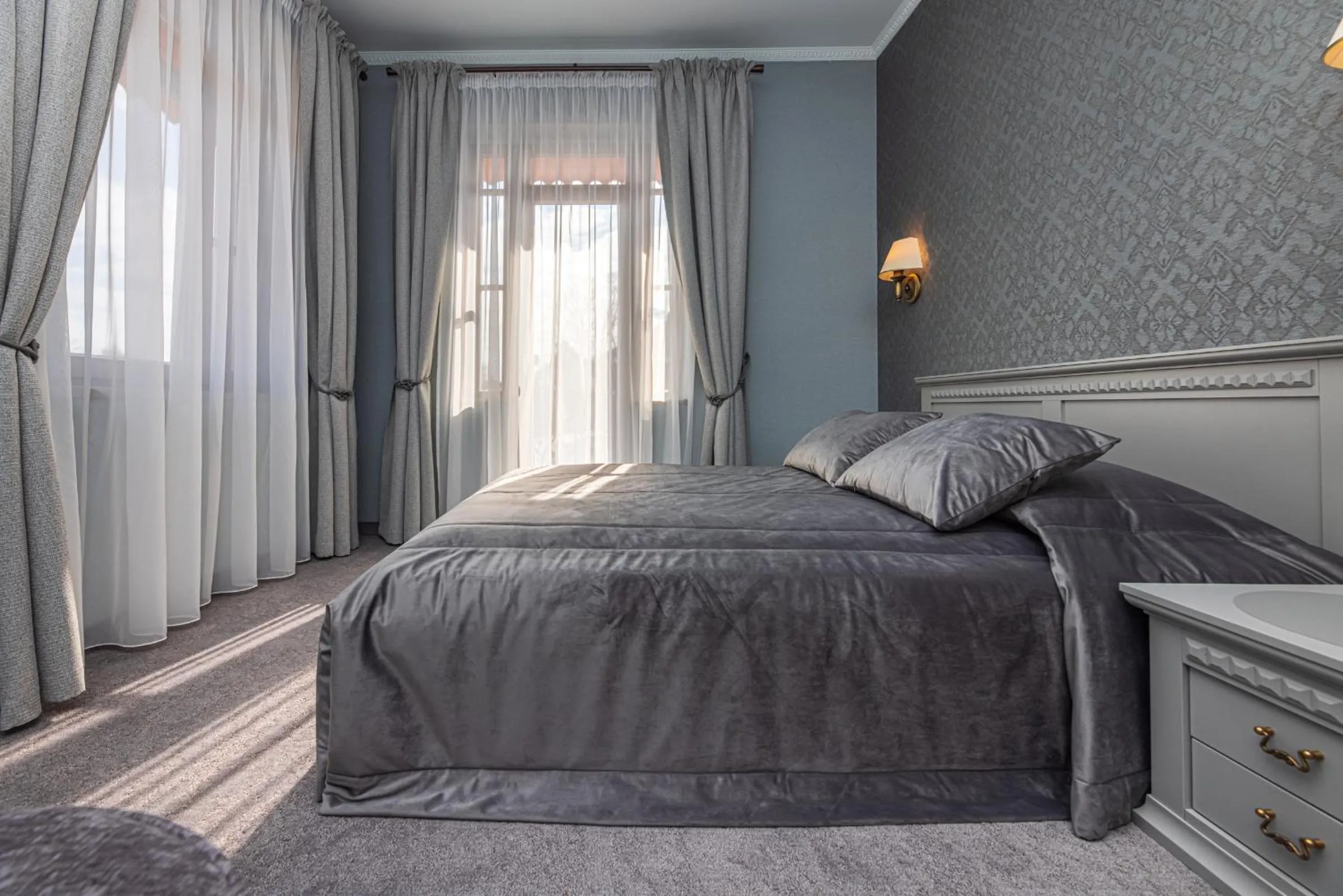 Bed in Senoji Hansa Hotel