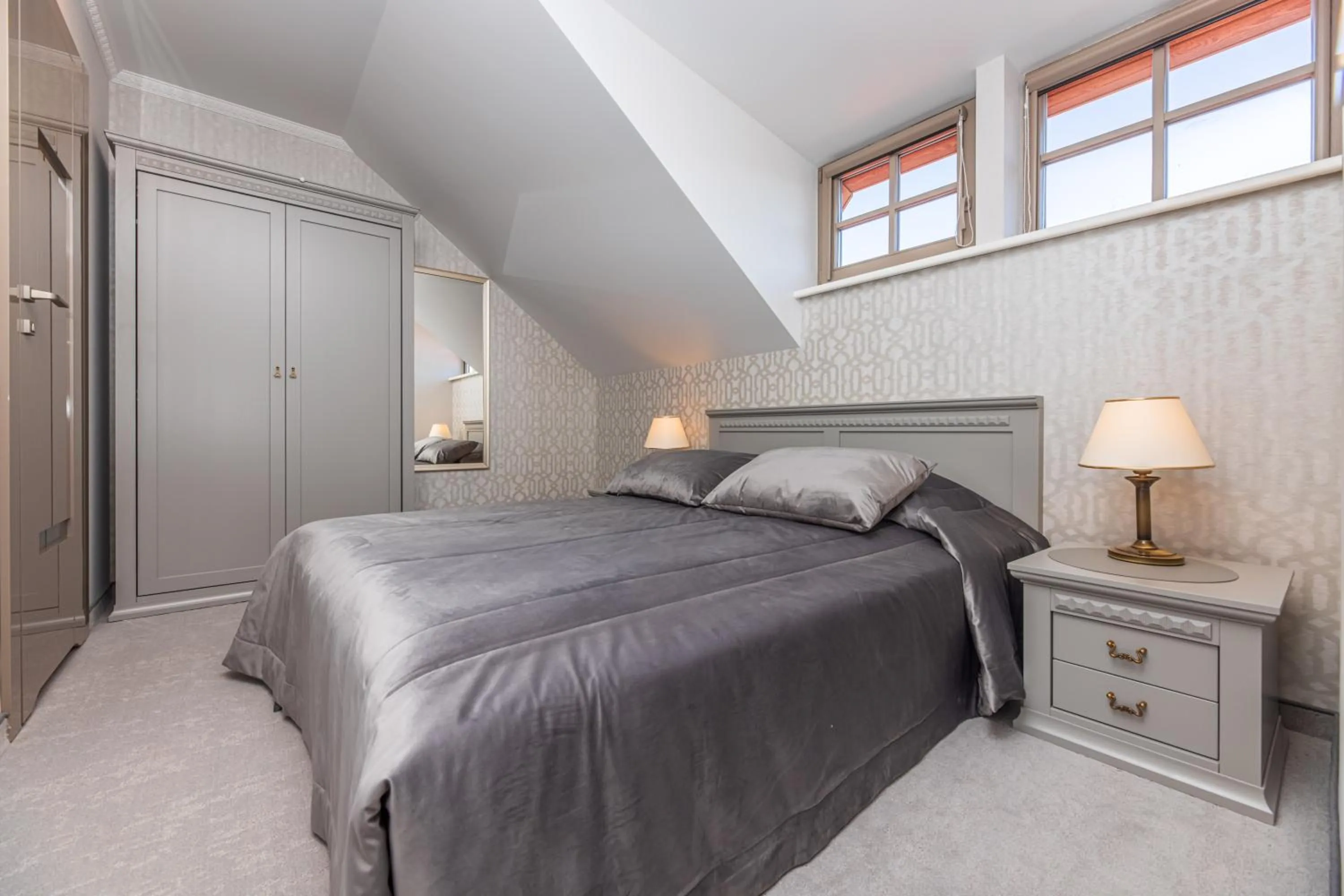 Bed in Senoji Hansa Hotel