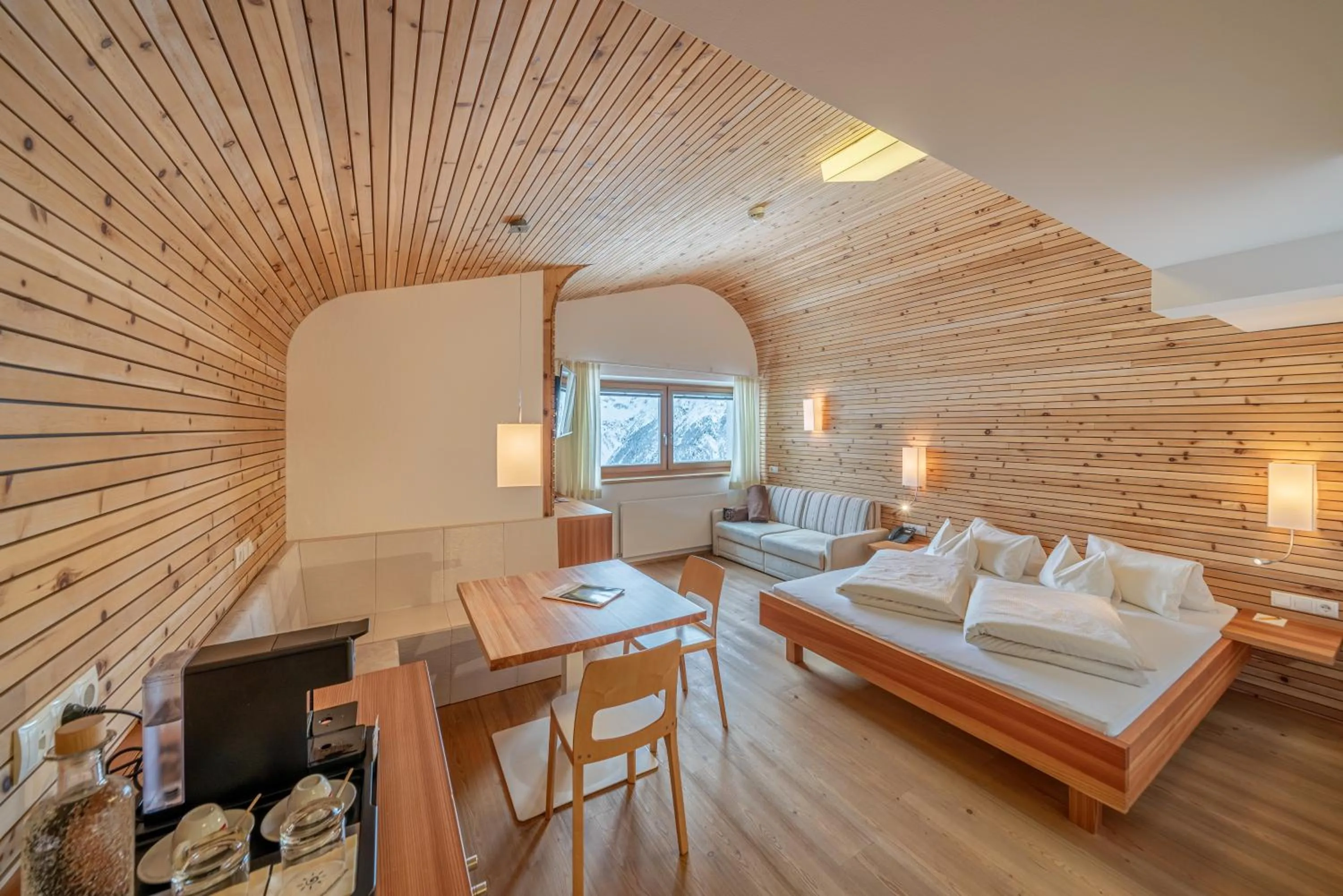 Seating area, Bed in Hotel Hochsölden