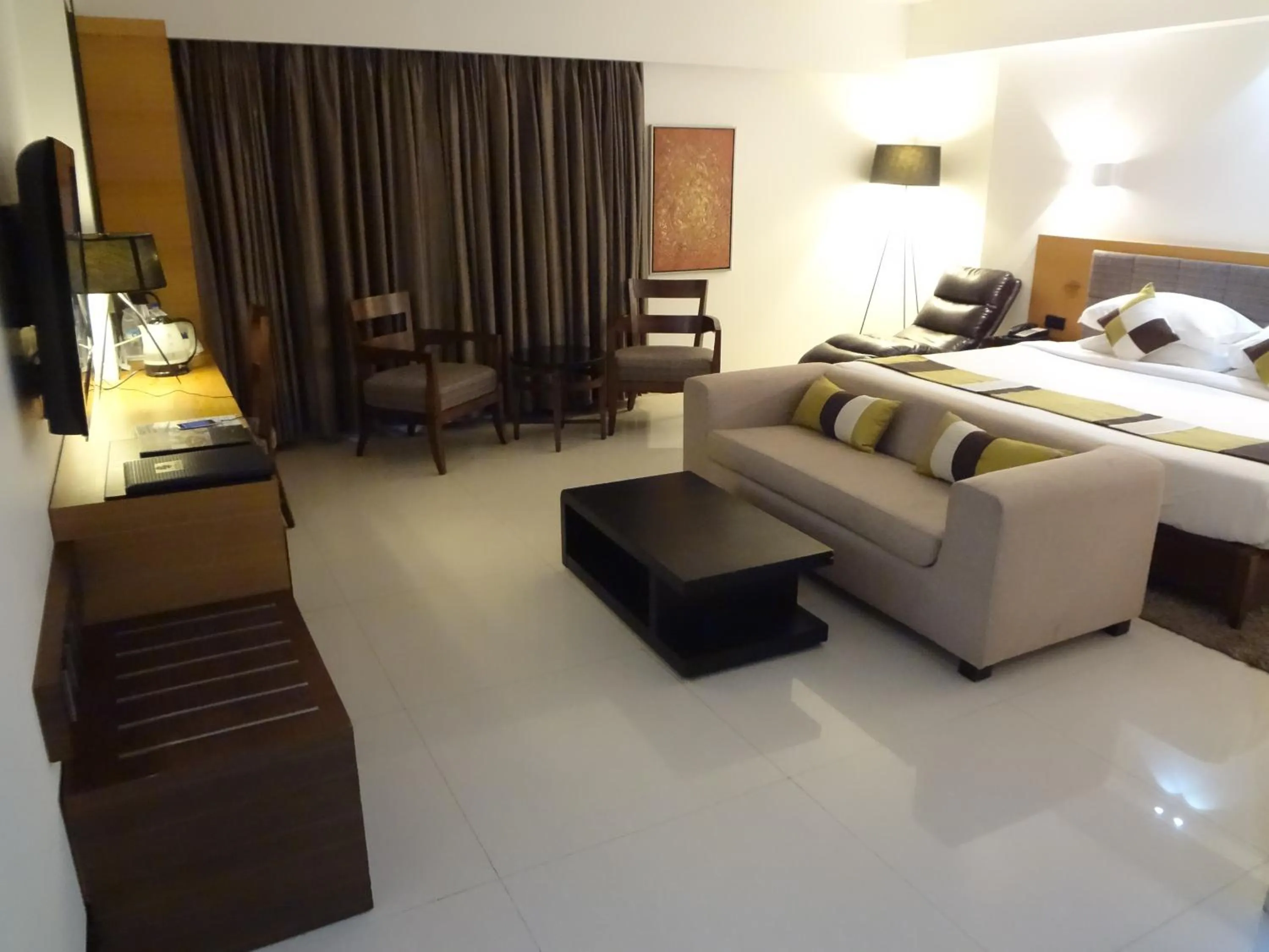 Photo of the whole room, Bed in Hotel Suba International Sahar Road Mumbai