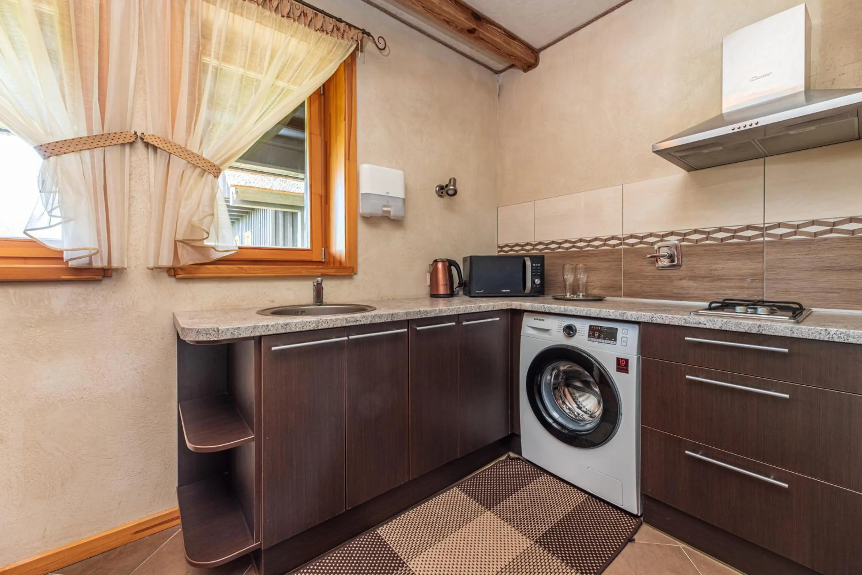 Kitchen or kitchenette in Pajūrio Sodyba