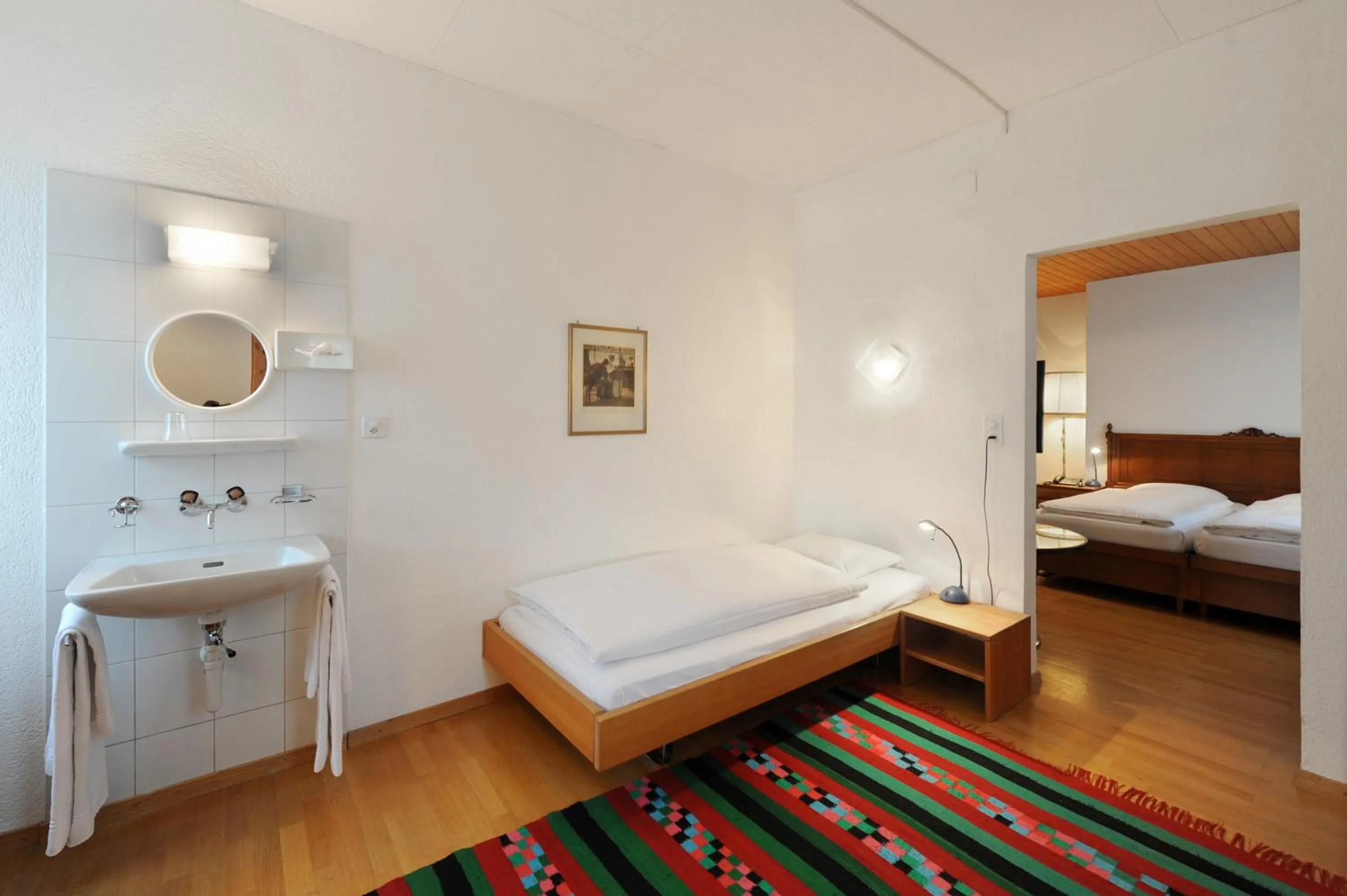 Photo of the whole room, Bed in Hotel National Bern