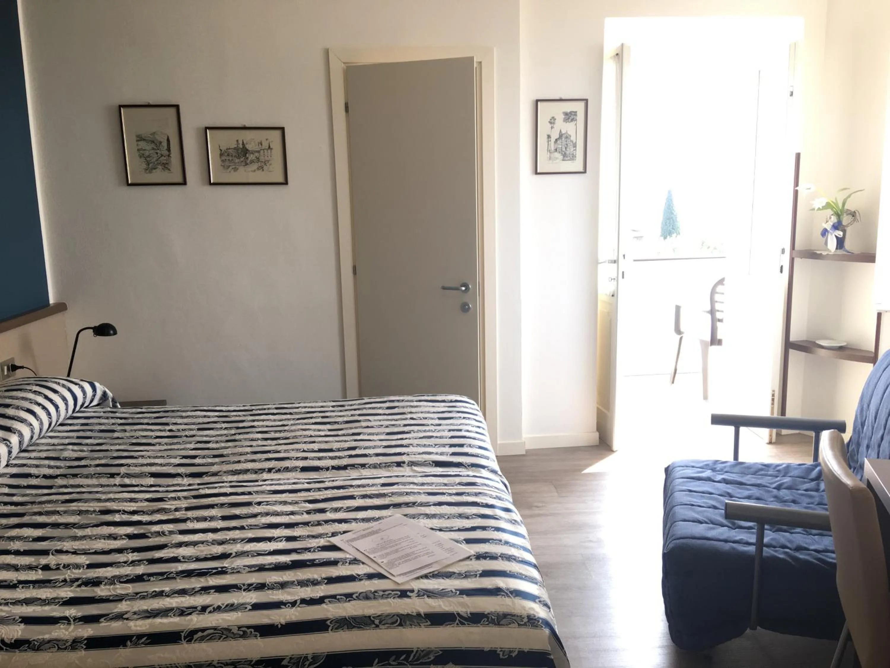 Bed in Belvedere Hotel & Villa