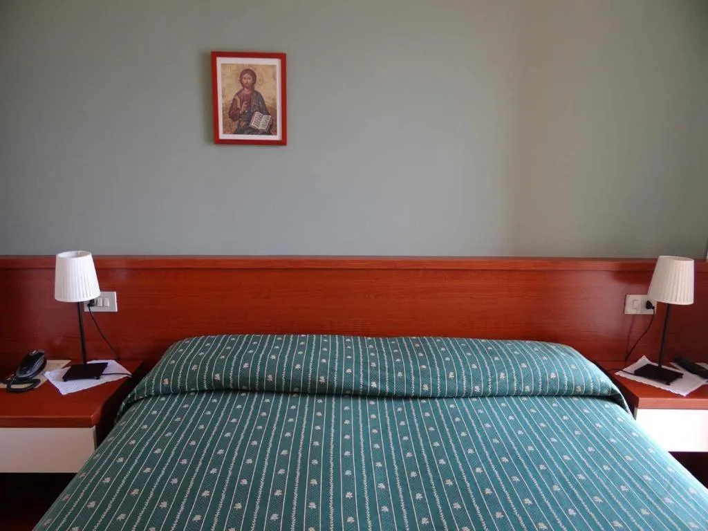 Bed in Belvedere Hotel & Villa