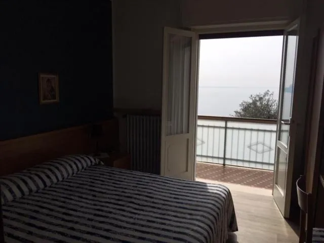 Bedroom in Belvedere Hotel & Villa