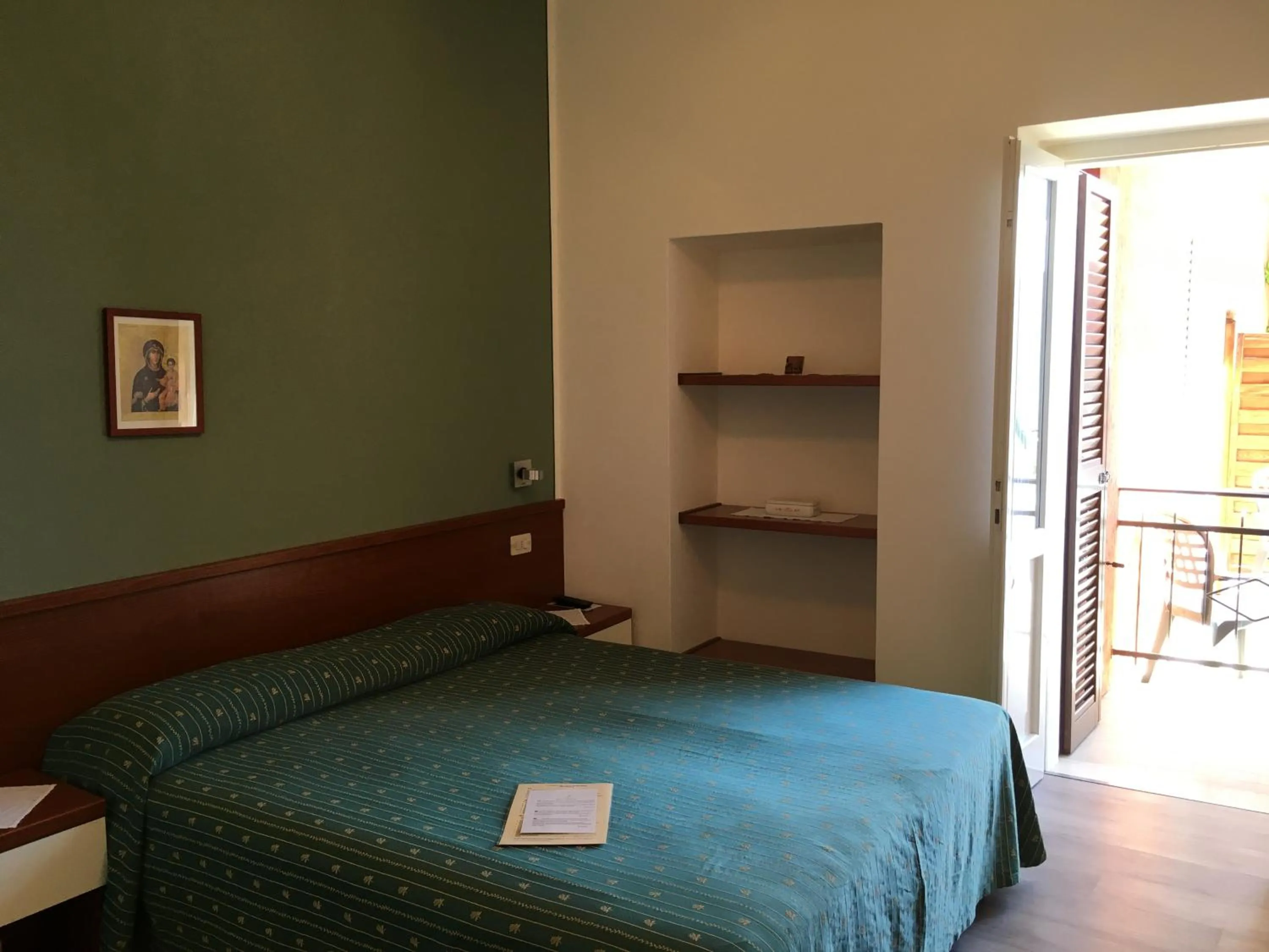 Bed in Belvedere Hotel & Villa