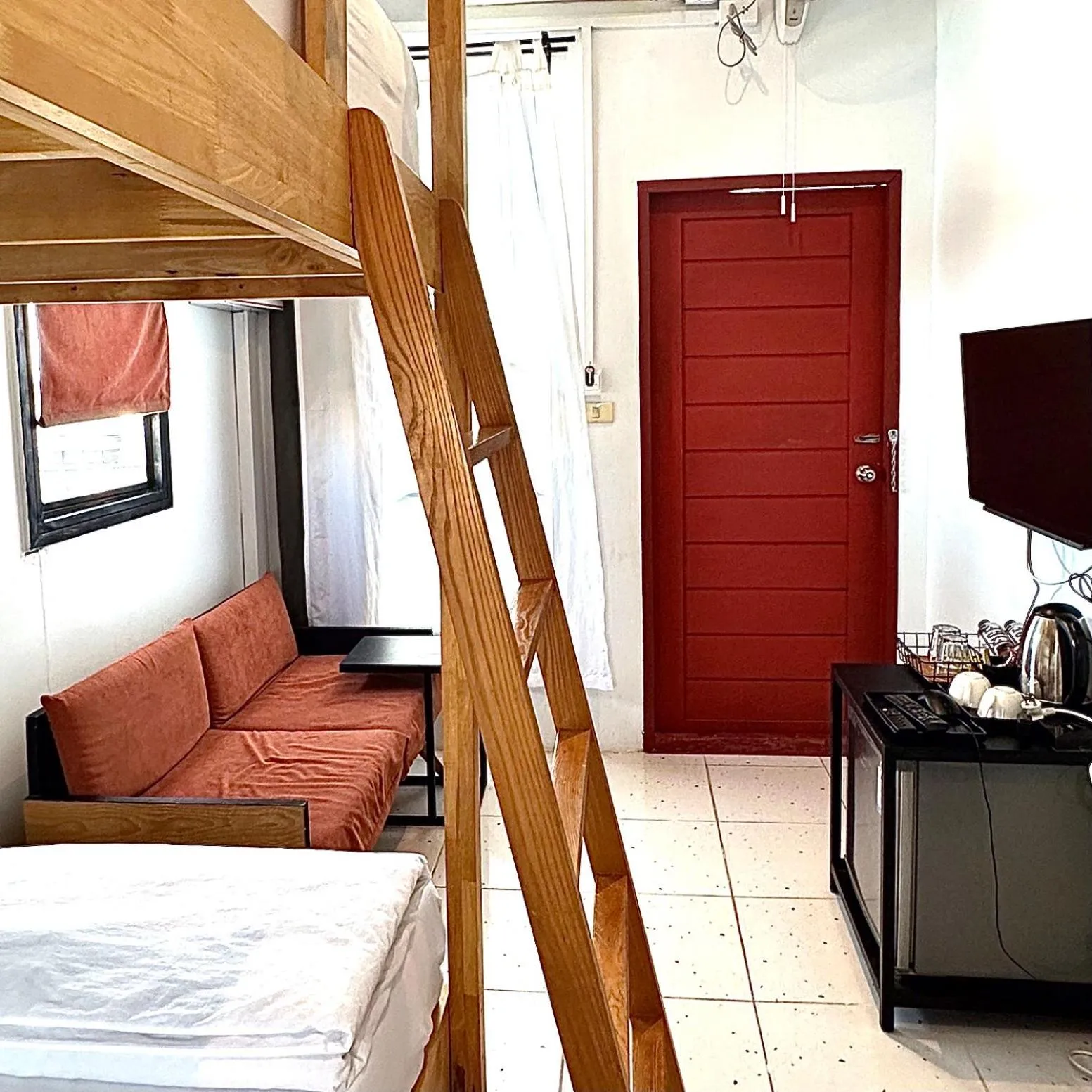 Bed in Beige Poshtels + Netflix