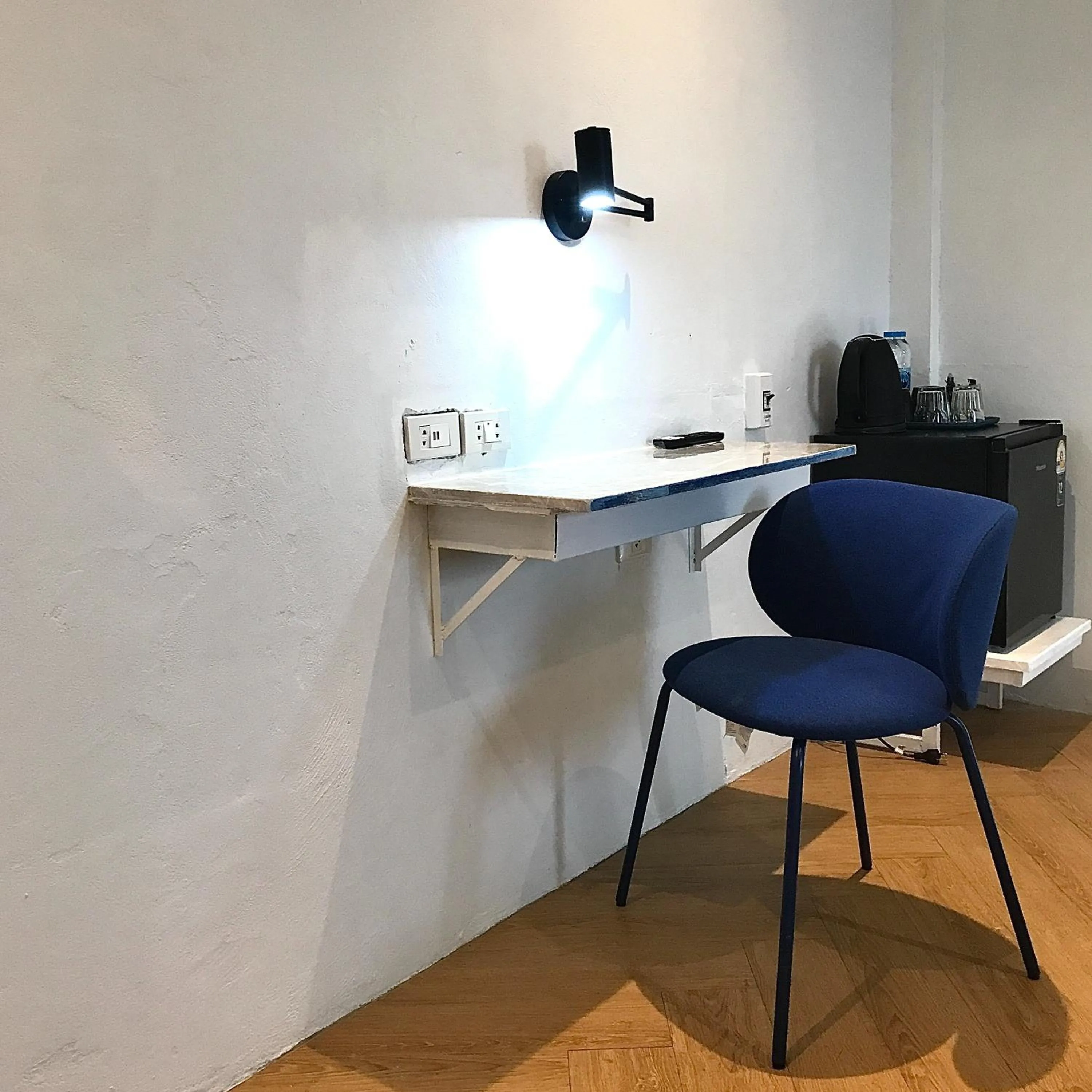 Seating area in Beige Poshtels + Netflix