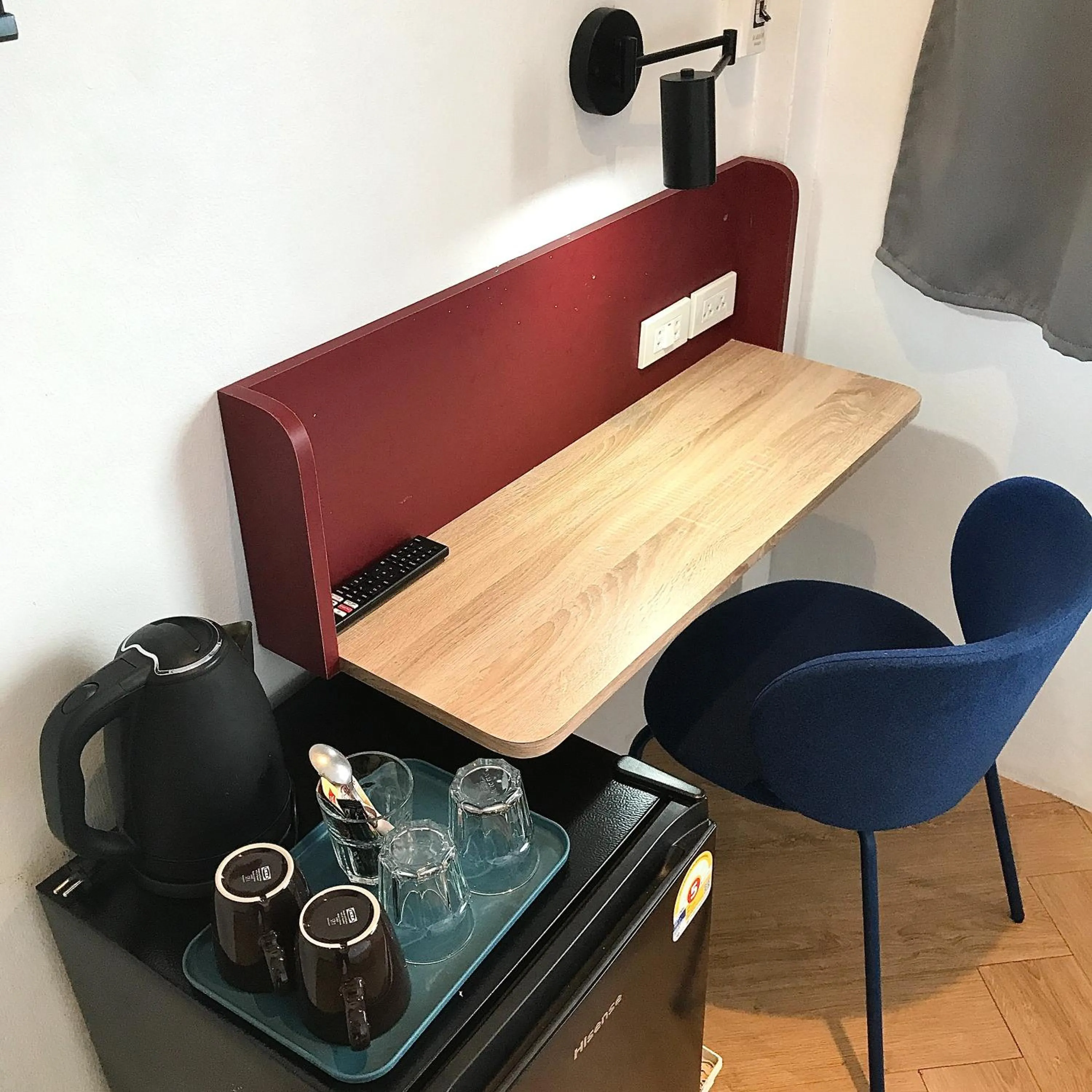 Seating area in Beige Poshtels + Netflix