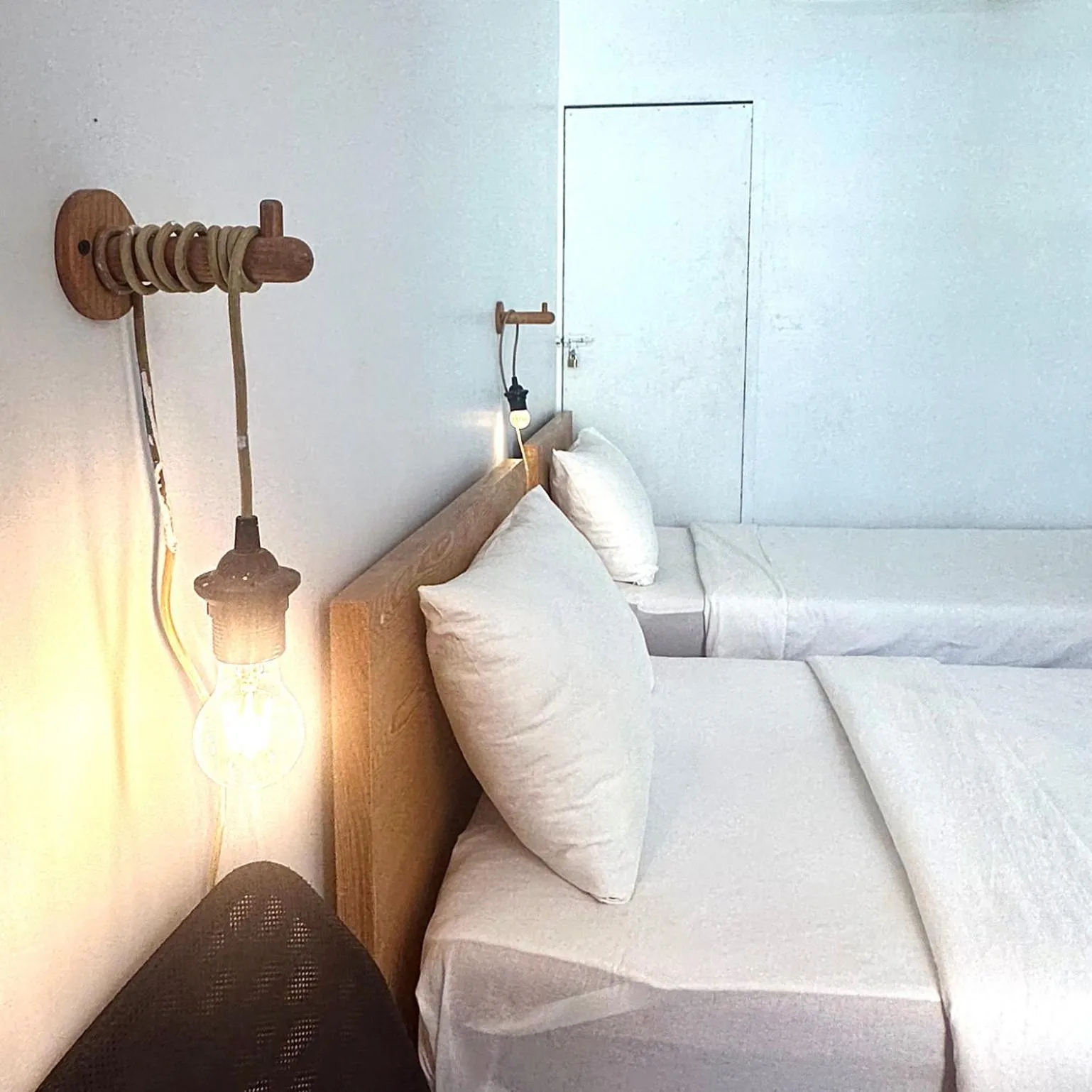 Bed in Beige Poshtels + Netflix