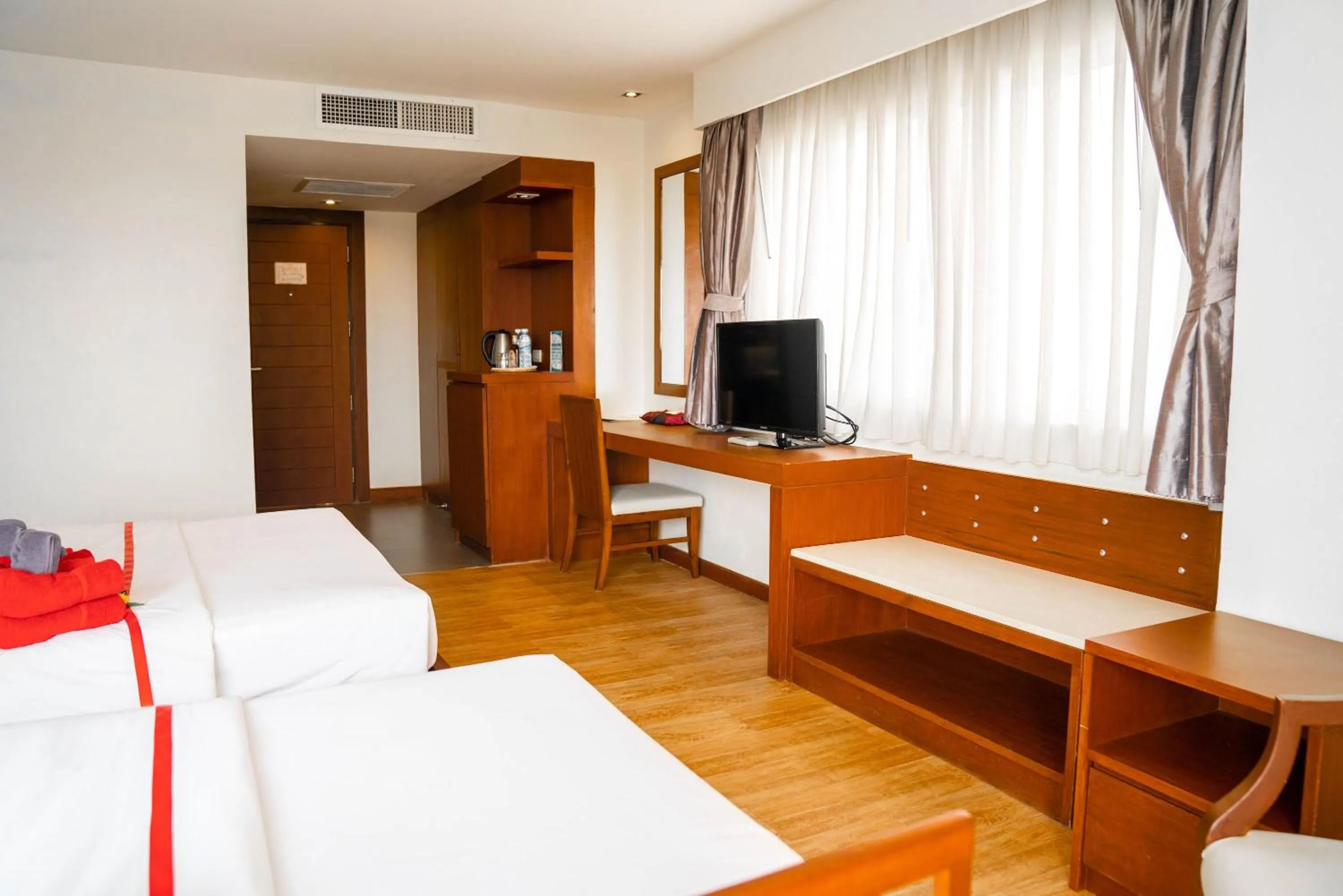Bed in Grand Jomtien Palace Hotel - SHA Extra Plus