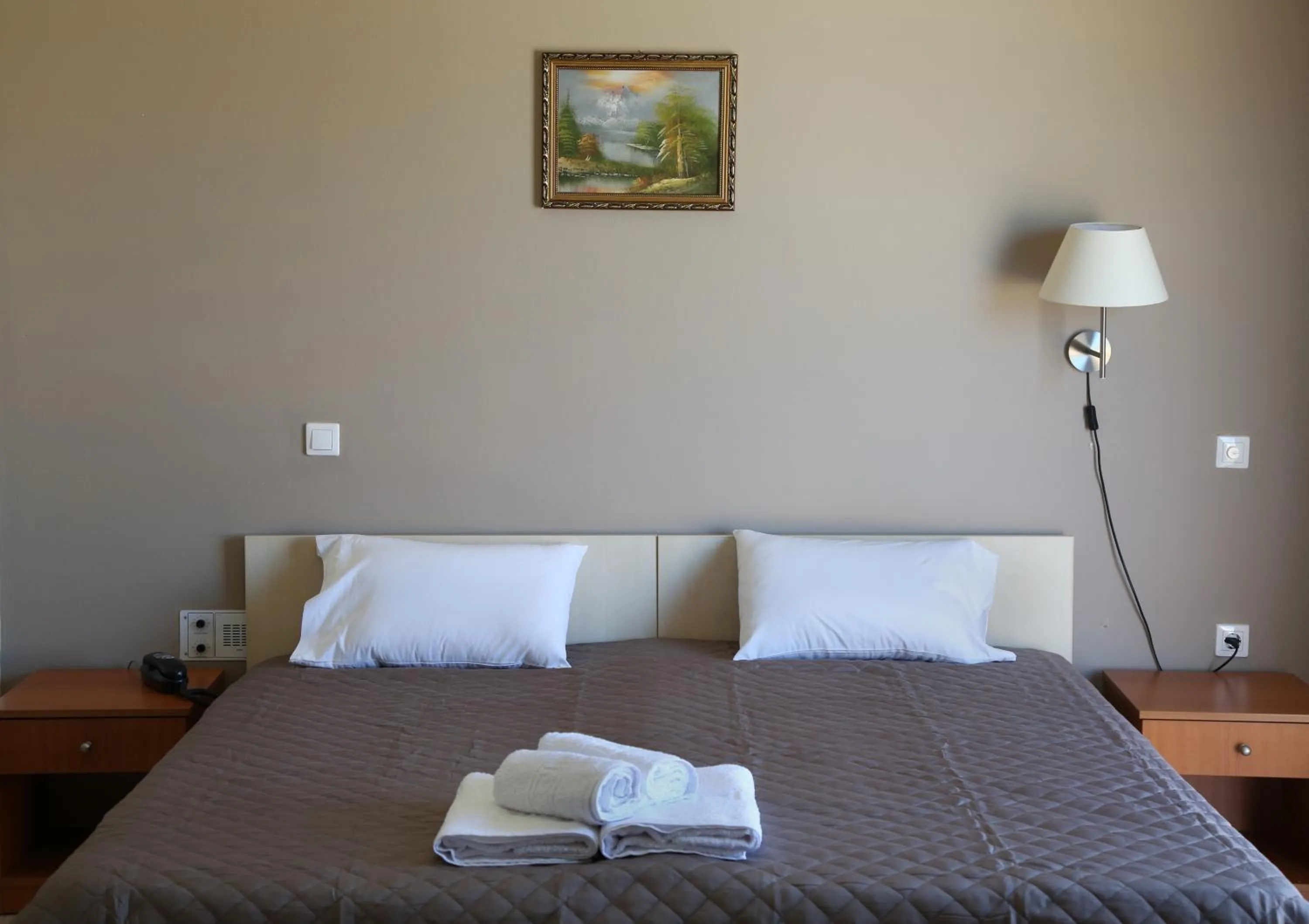 Bed in Hotel Sea Breeze