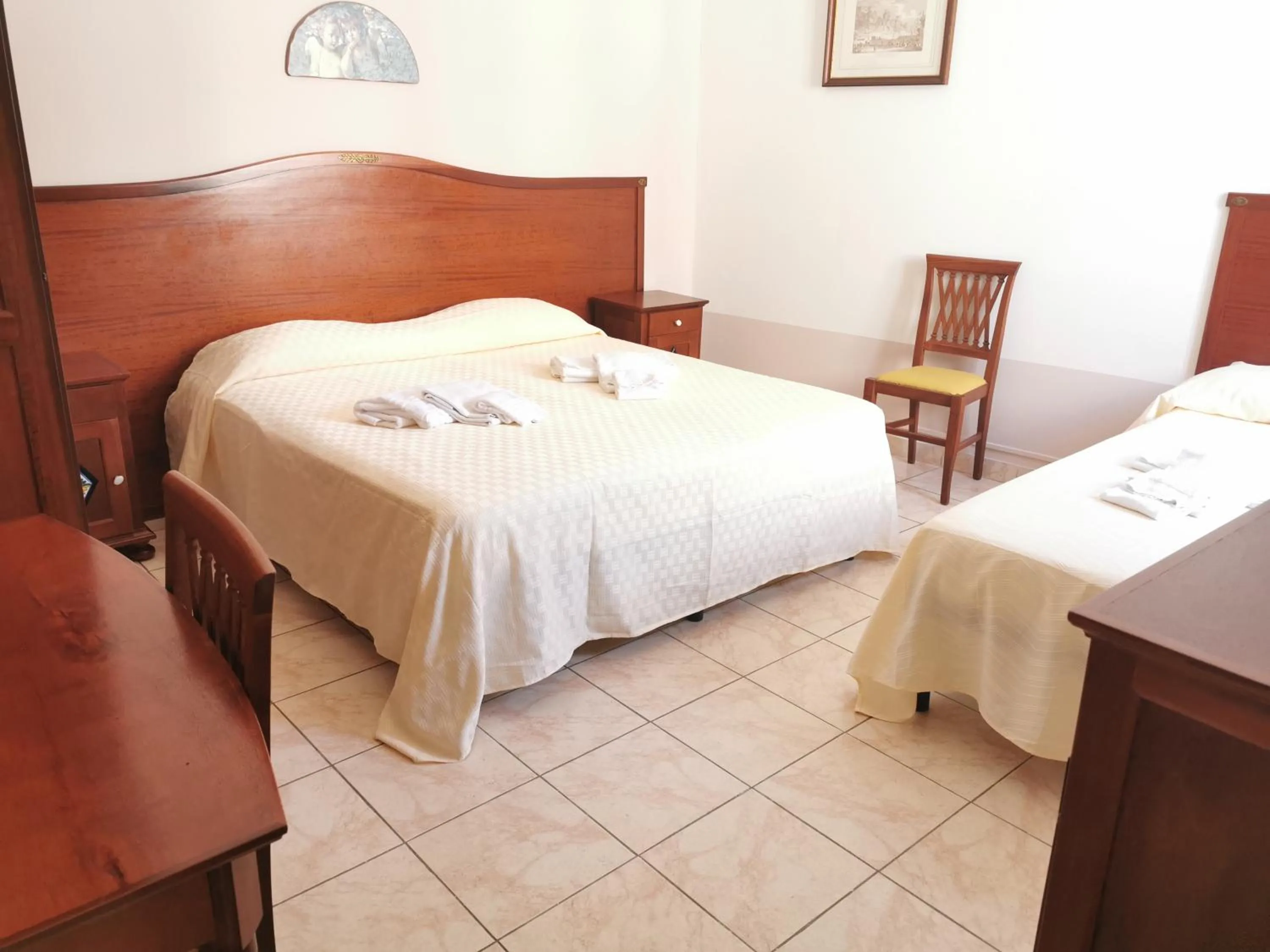 Photo of the whole room in I Cappuccini Rooms