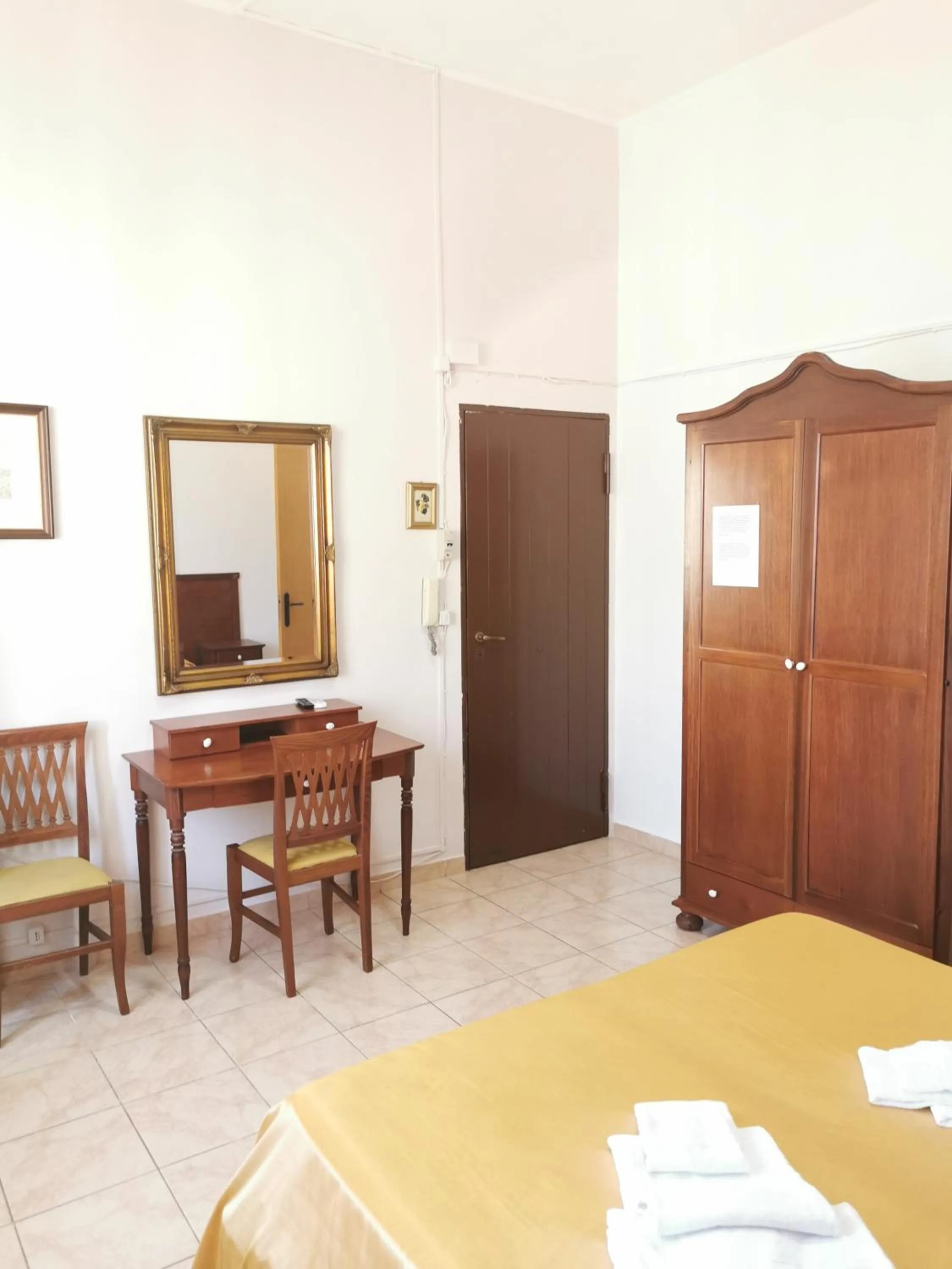 Bedroom in I Cappuccini Rooms