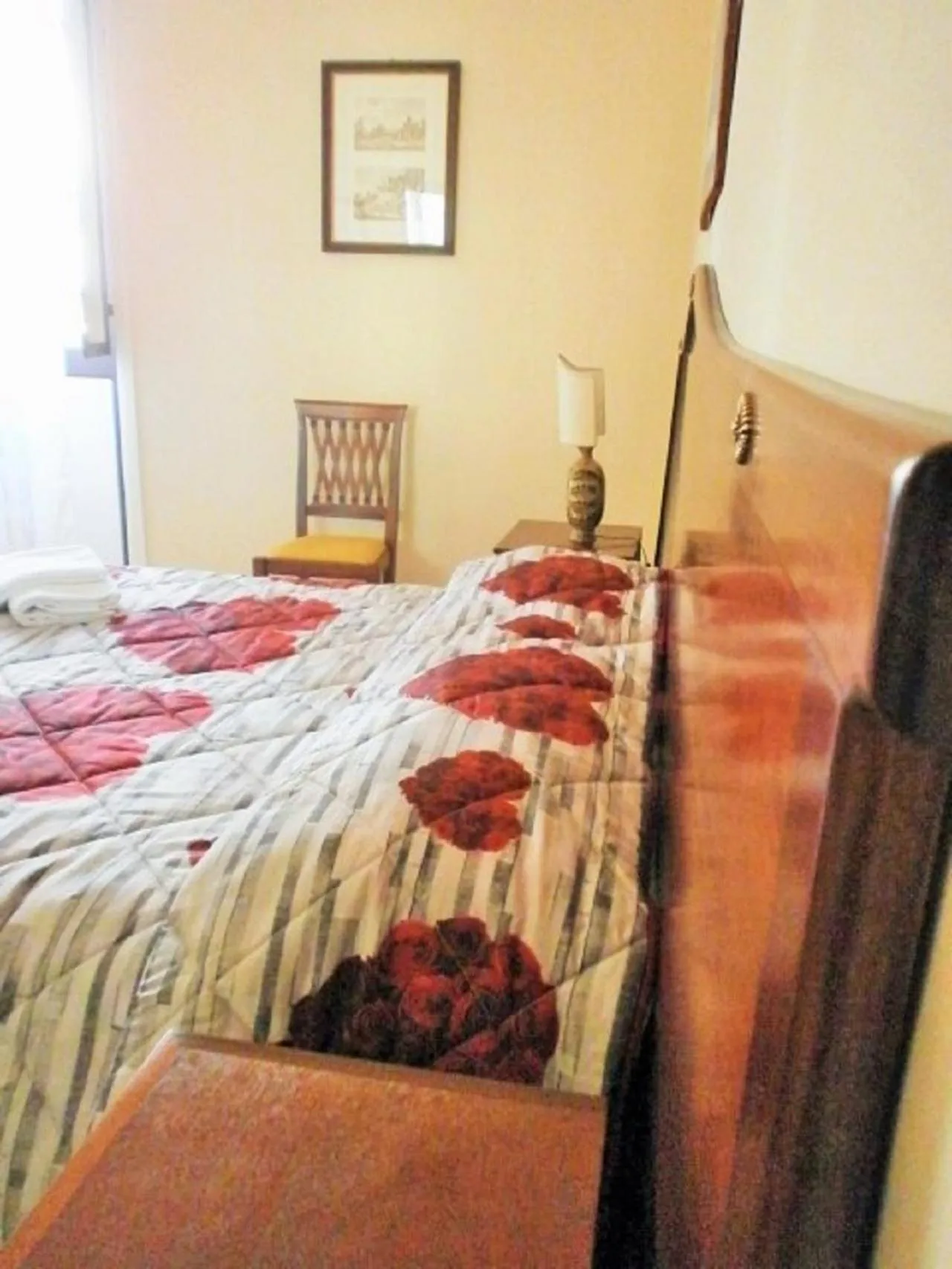 Bed in I Cappuccini Rooms