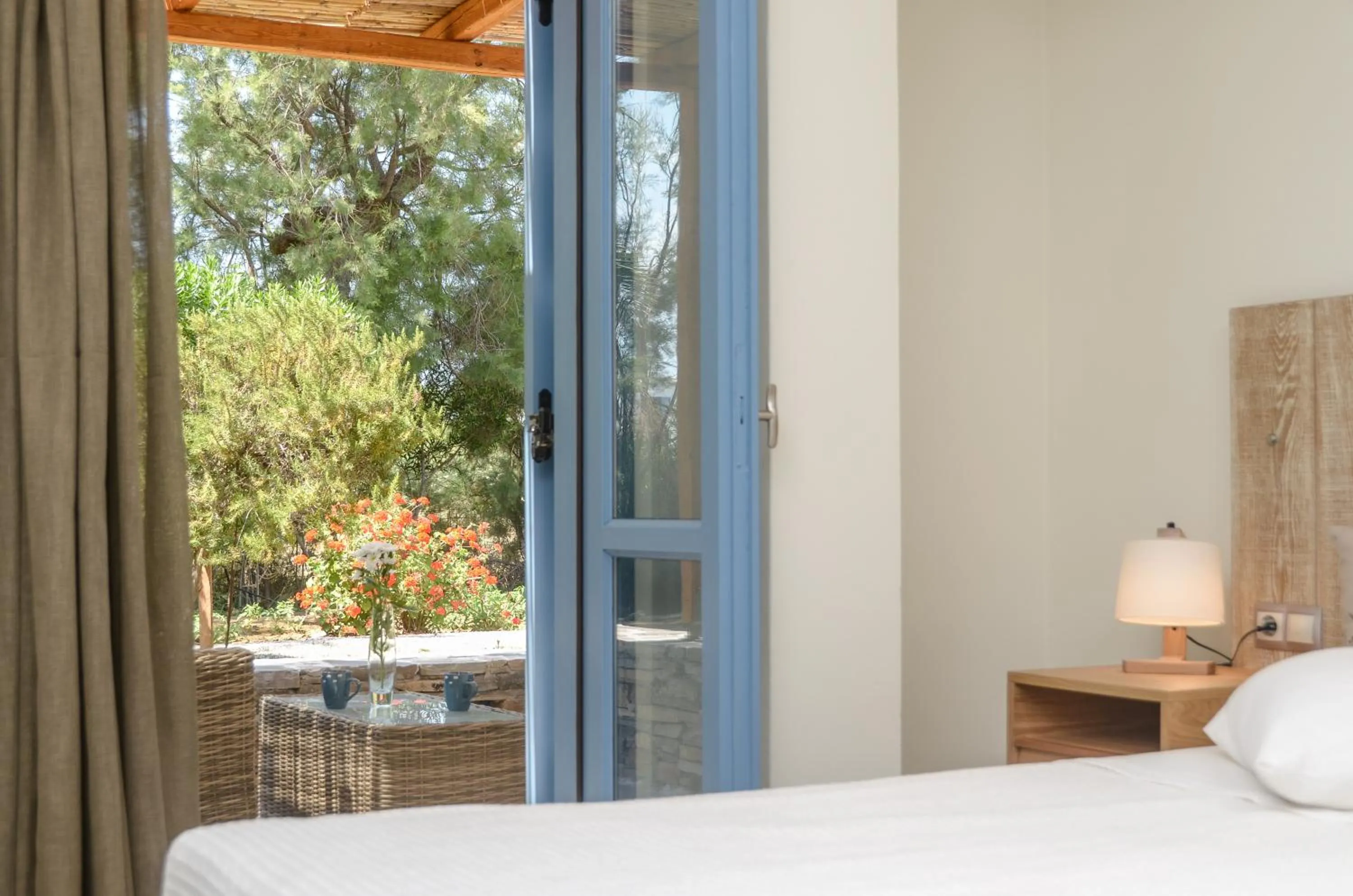 Garden view, Bed in Alkyoni Beach Hotel