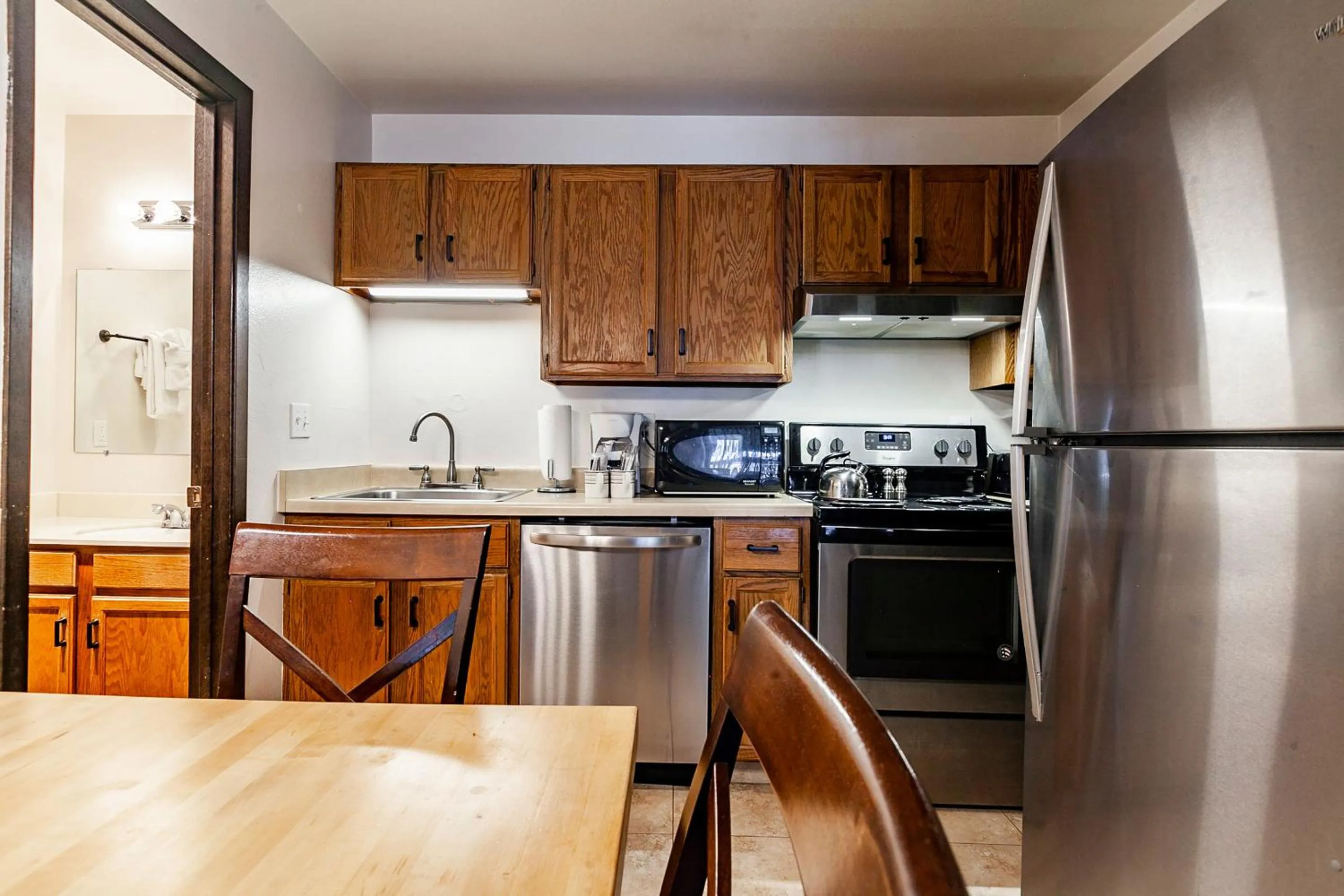 Kitchen or kitchenette in Red Pine Condominiums by All Seasons Resort Lodging