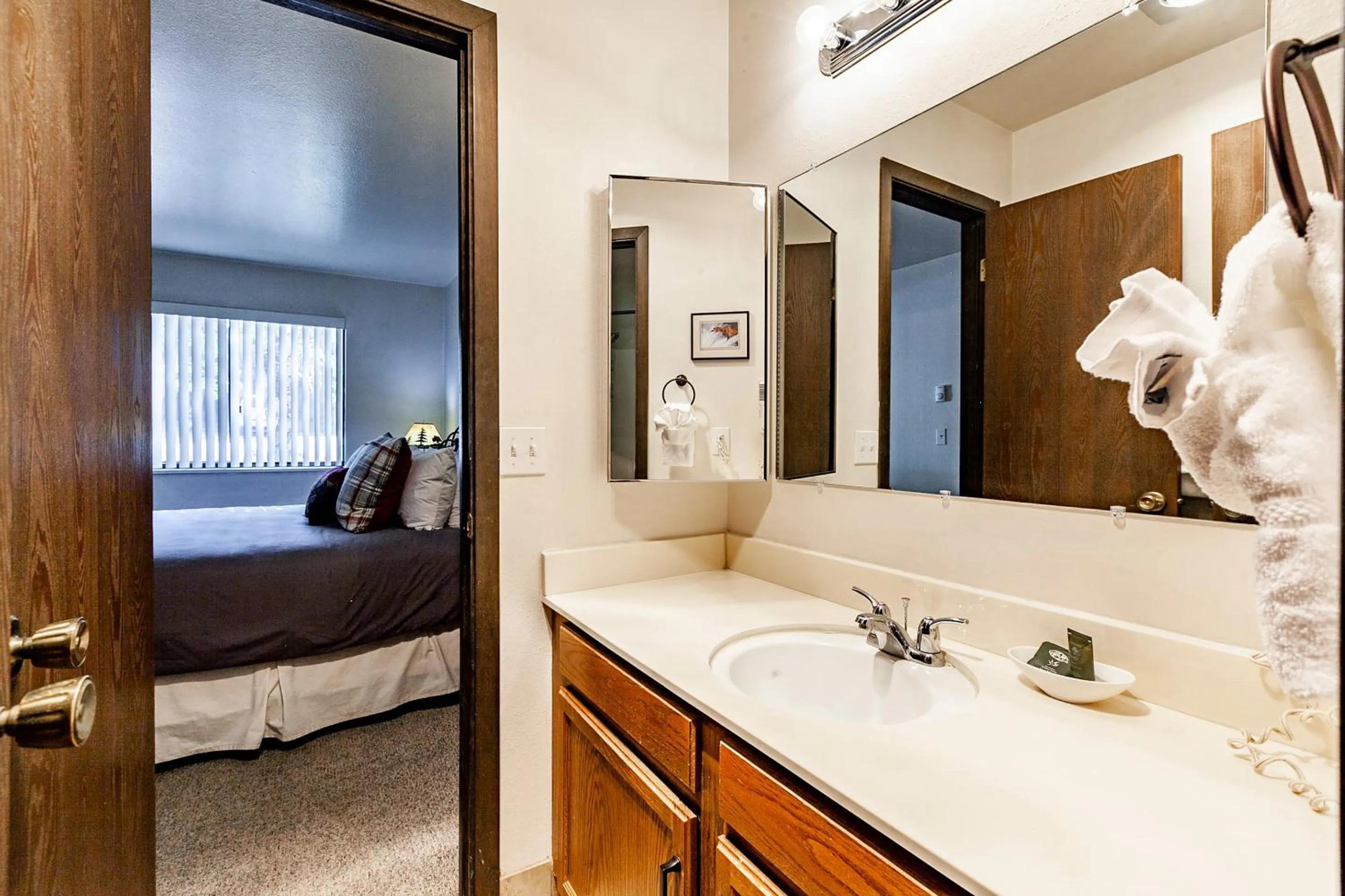 Bathroom, Bed in Red Pine Condominiums by All Seasons Resort Lodging
